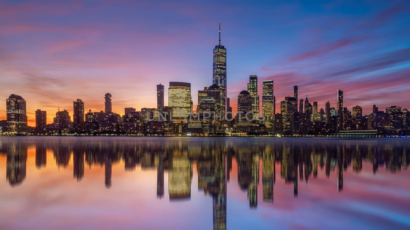 New York City downtown skyline at sunset - beautiful cityscape in USA