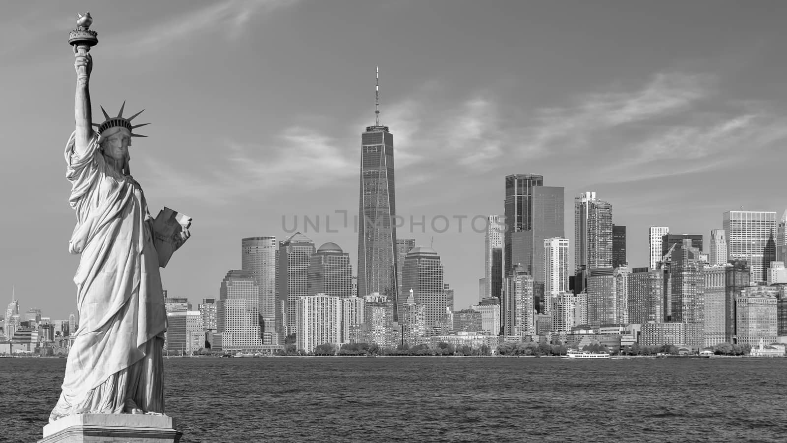 The Statue of Liberty with Manhattan city skyline by f11photo