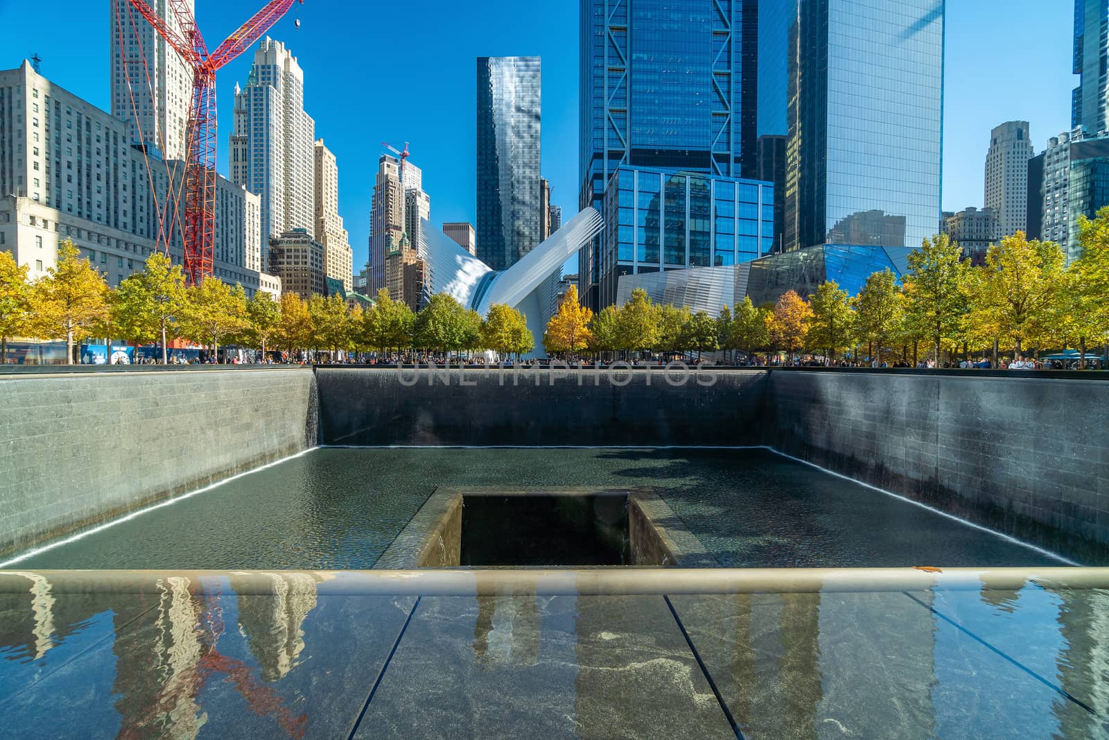 9/11 Memorial at World Trade Center Ground Zero in downtown Manh by f11photo