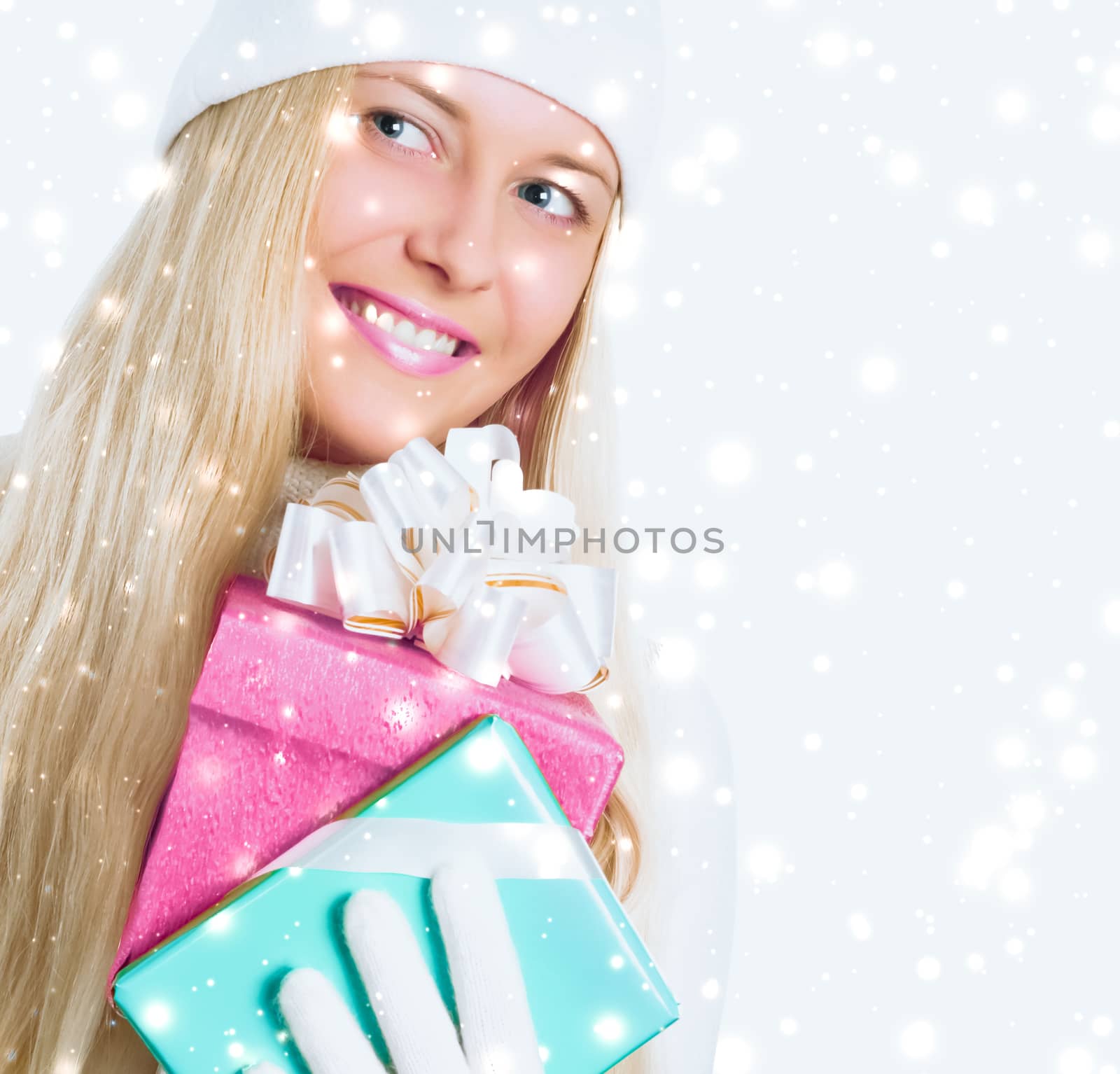 Christmas surprise and glitter snow background, happy blonde with gift boxes in winter season for shopping sale and holiday brands