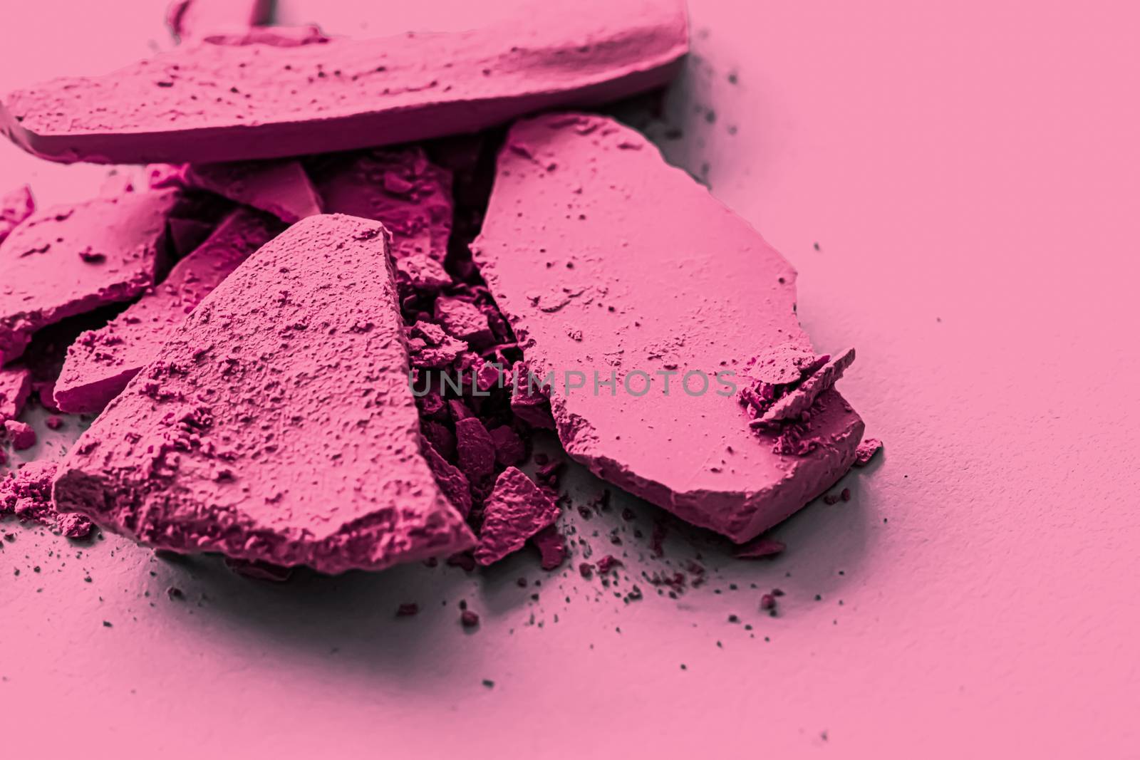Pink eye shadow powder as makeup palette closeup, crushed cosmetics and beauty texture by Anneleven