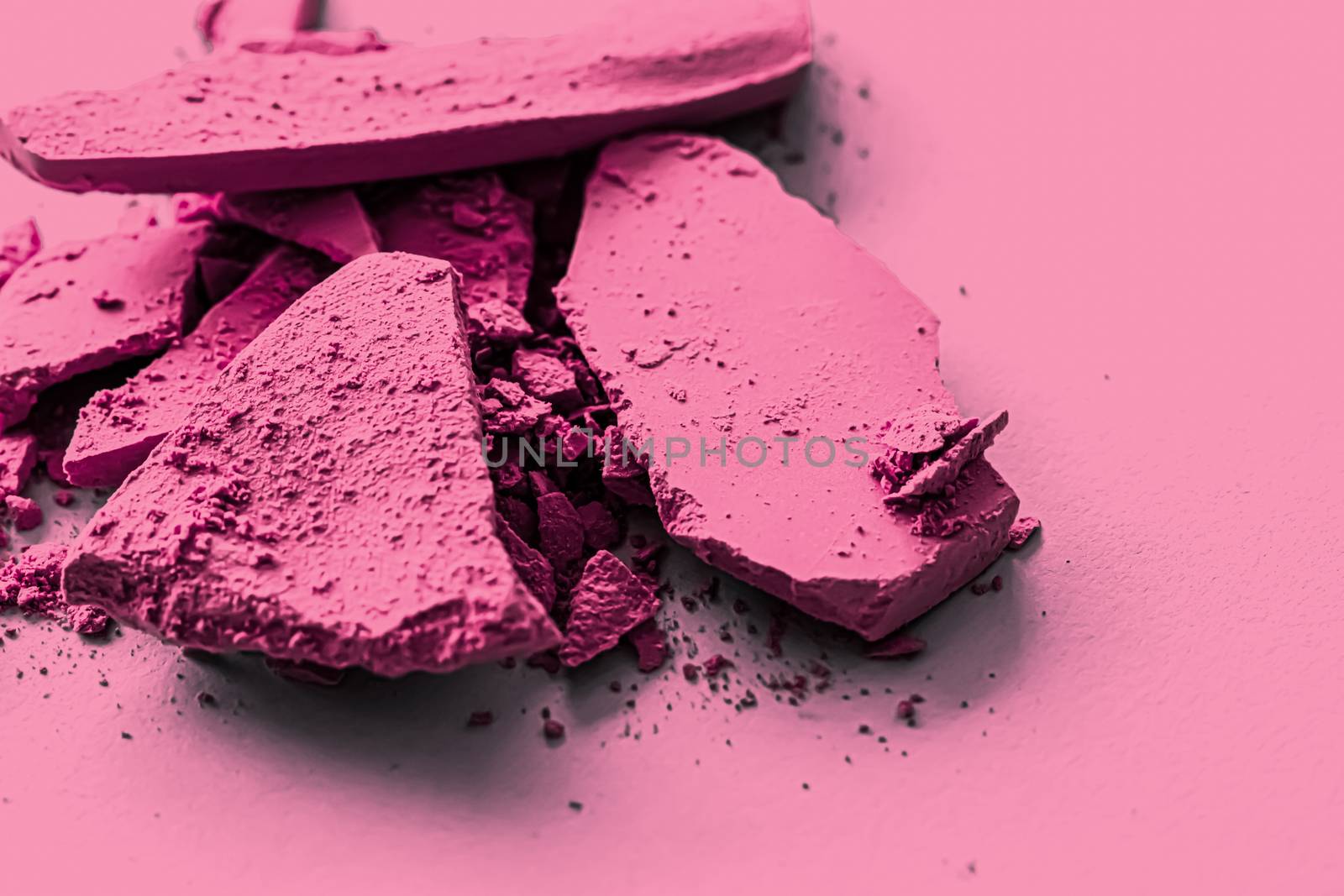 Pink eye shadow powder as makeup palette closeup, crushed cosmetics and beauty textures