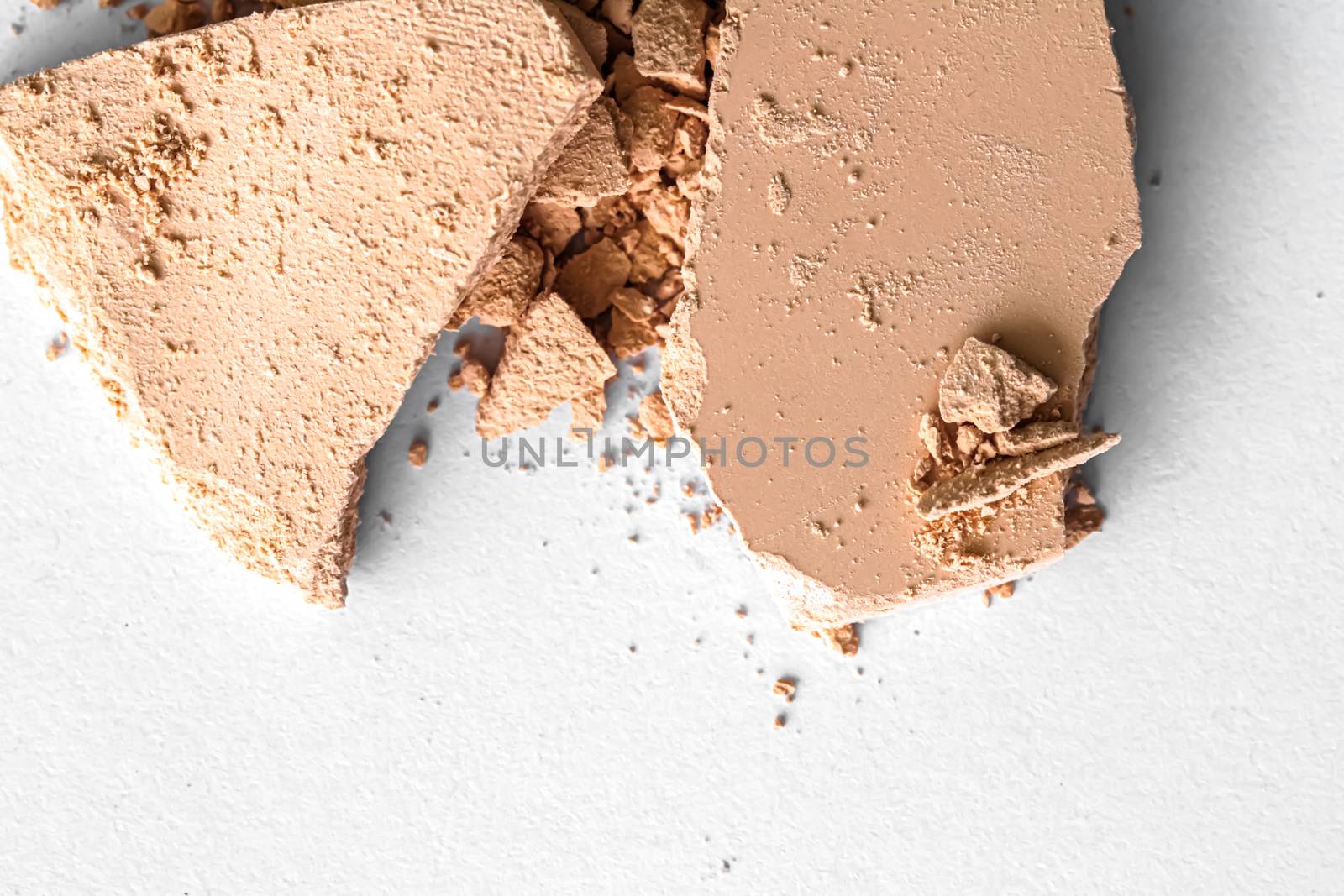 Beige eye shadow powder as makeup palette closeup isolated on white background, crushed cosmetics and beauty texture by Anneleven