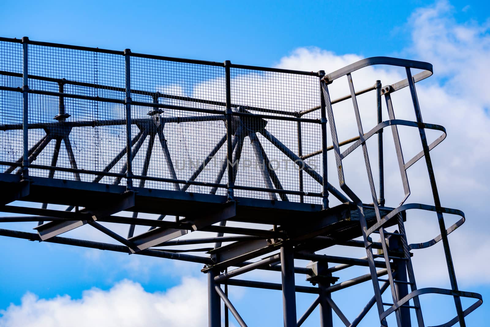 Work of a gantry crane on building site by paddythegolfer