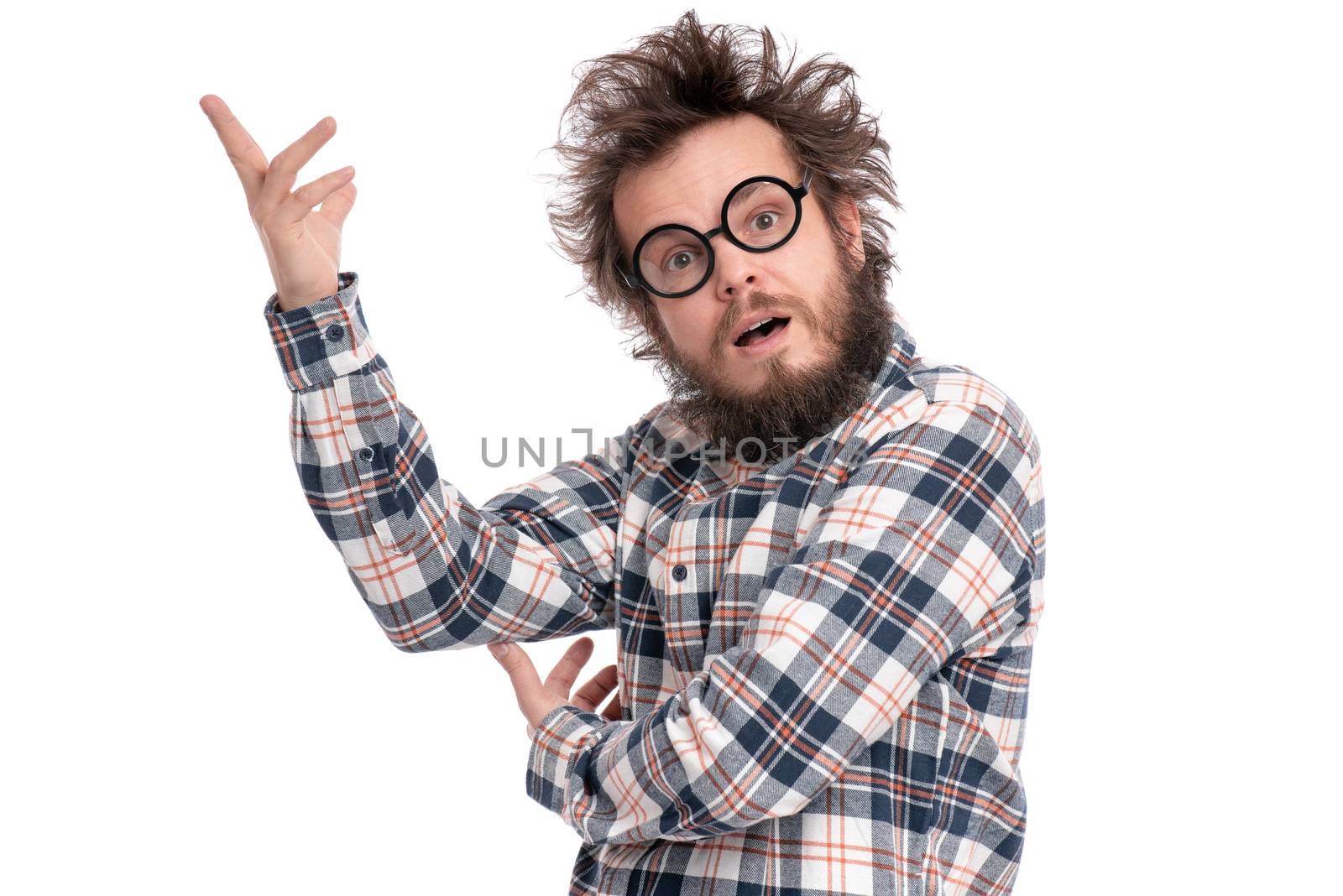 Crazy bearded Man with funny Haircut in eye Glasses - ponder and dreaming. Casual thinking guy in plaid shirt, isolated on white background. Emotions, and signs concept.