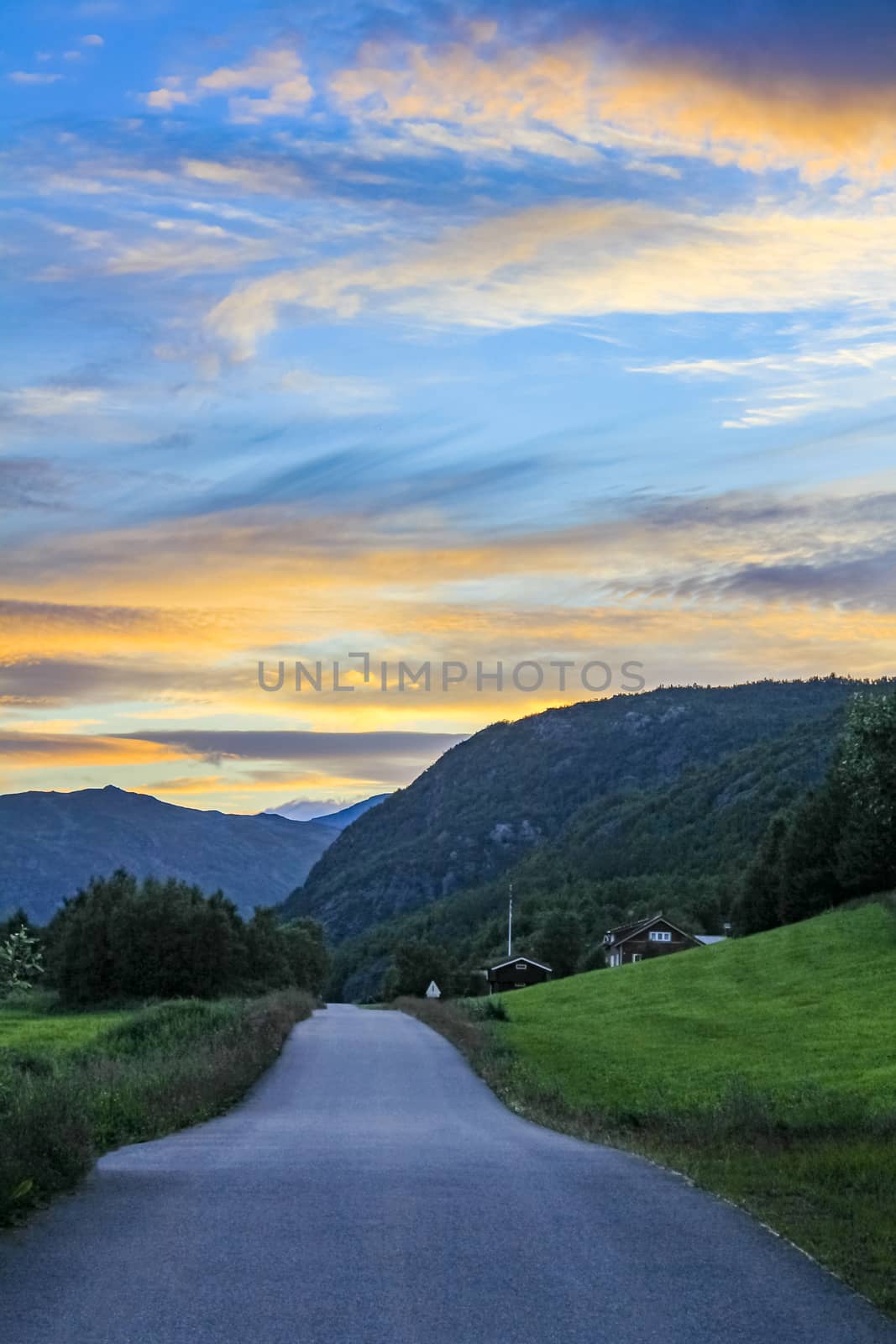 Spectacular sunset above mountains and valleys in beautiful Hemsedal, Norway. by Arkadij