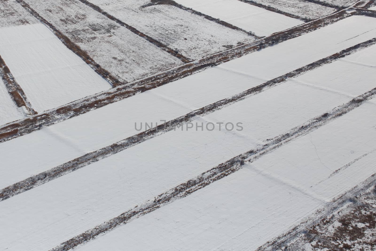 View from above. Agricultural fields in winter.