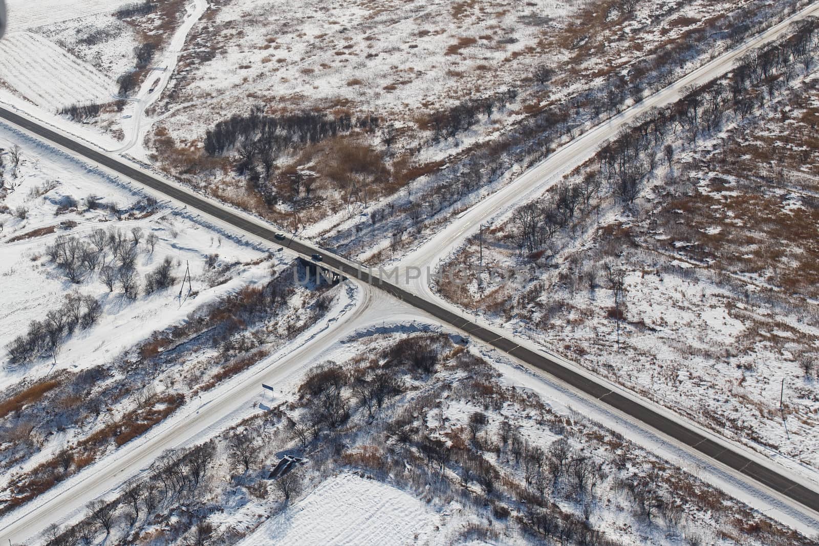 View from above. Agricultural fields in winter.