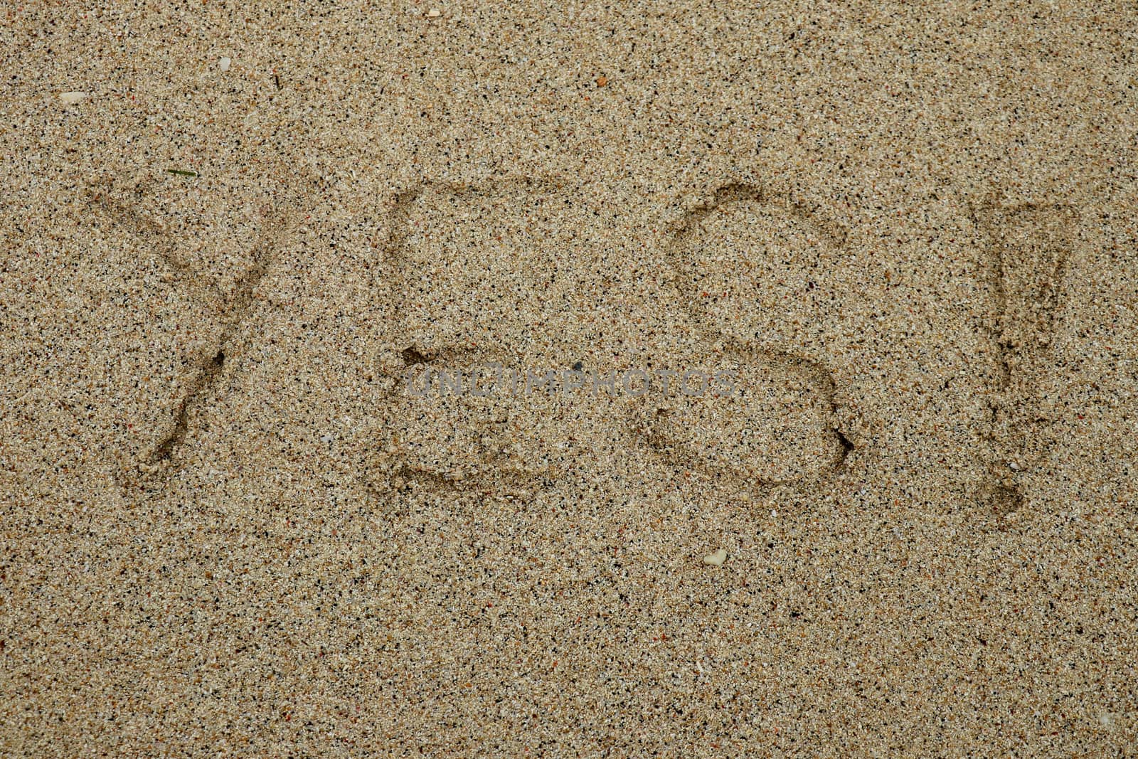 YES concept, positive changes in the life, word written on sand beach.