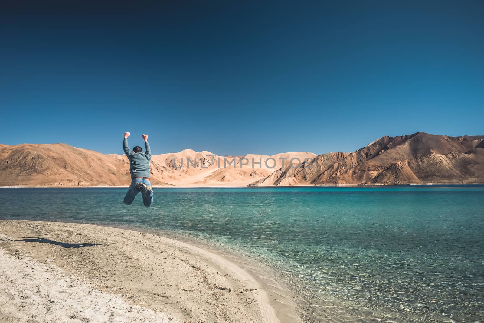 Lake in valley with mountains and blue sky background, Himalaya mountains in India