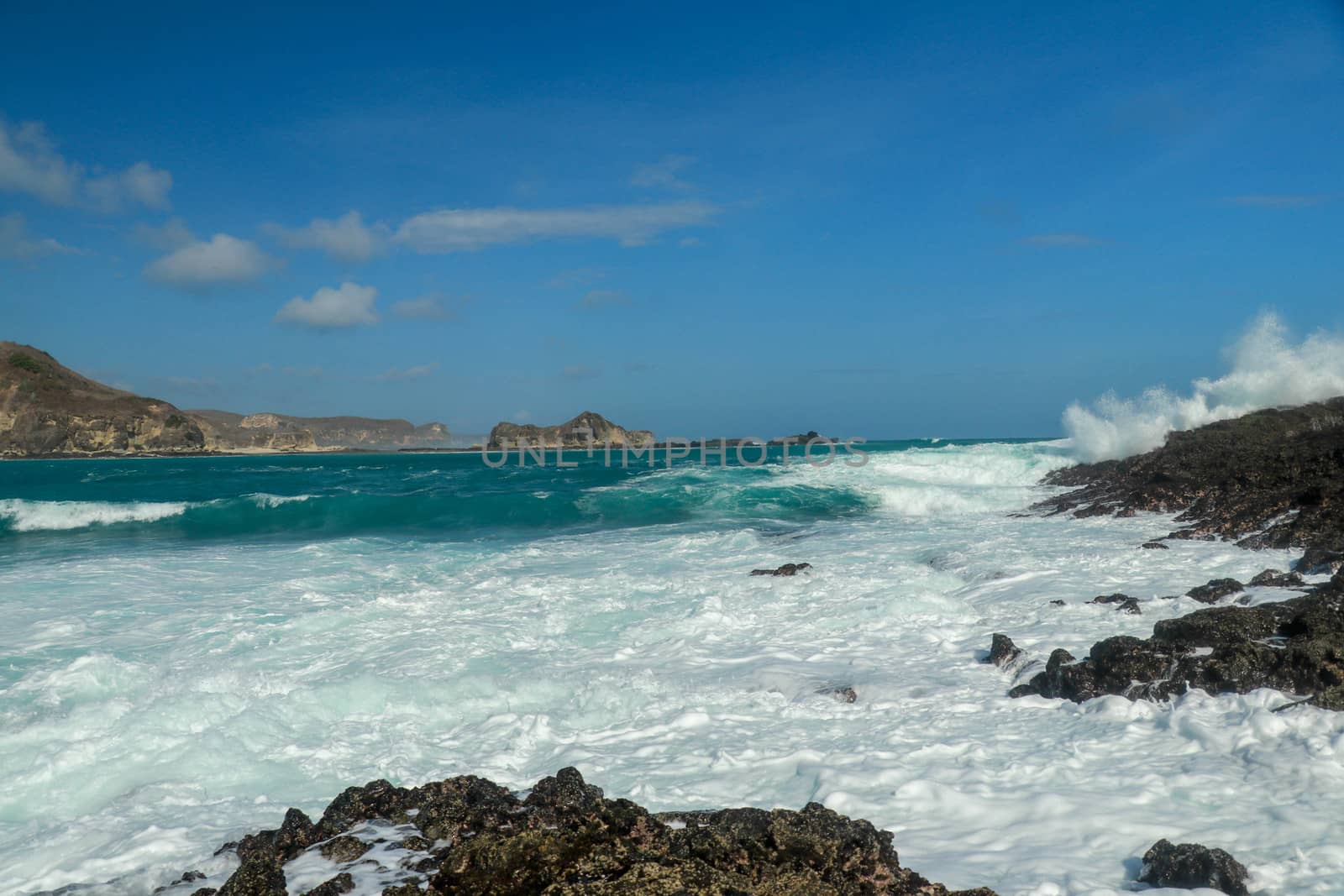 Dramatic coastline and beach on the Marese hill in Tanjung Aan, near Kuta, in south Lombok in Indonesia.