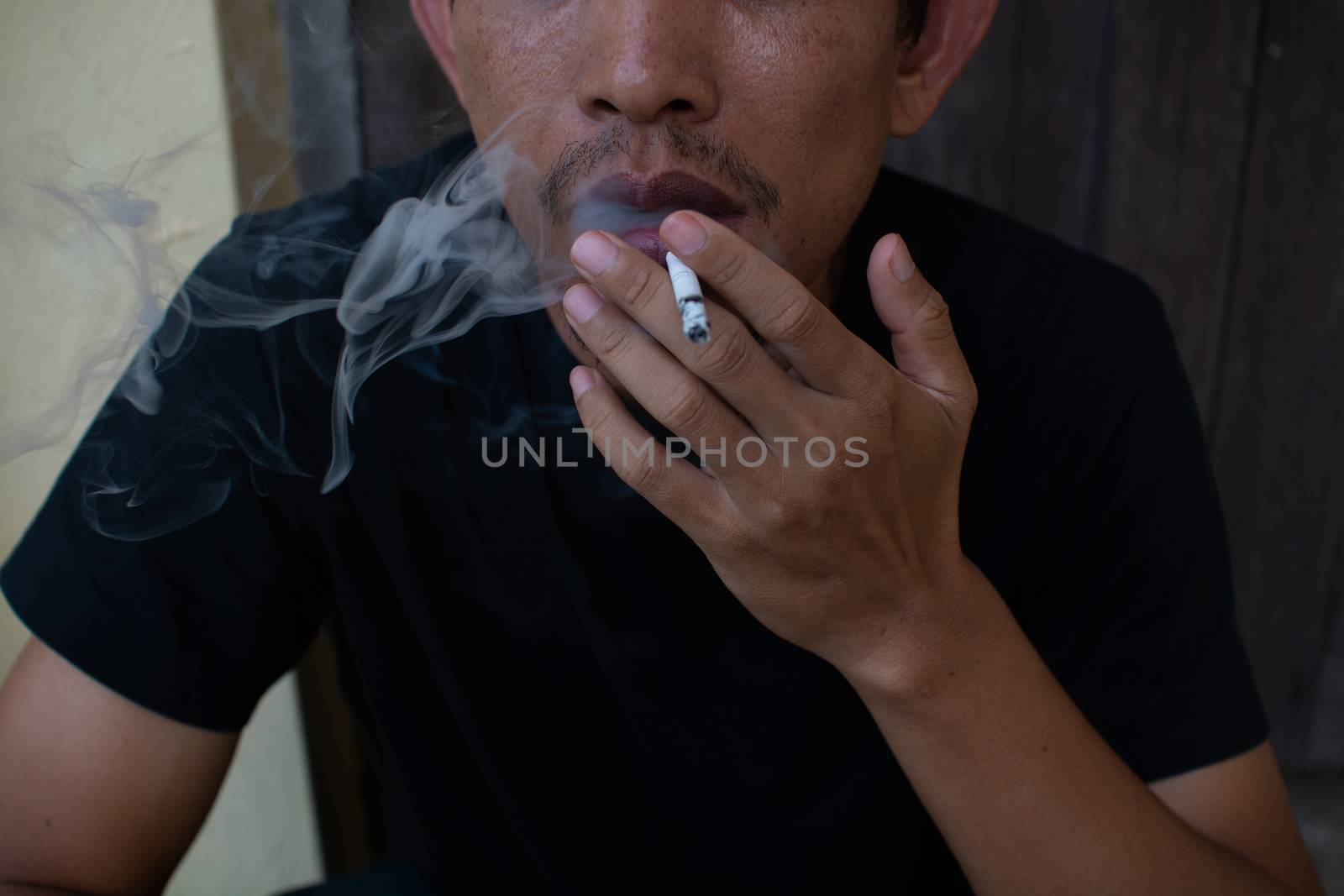 Man smoking cigarette, close-up photography  by cuckoo_111