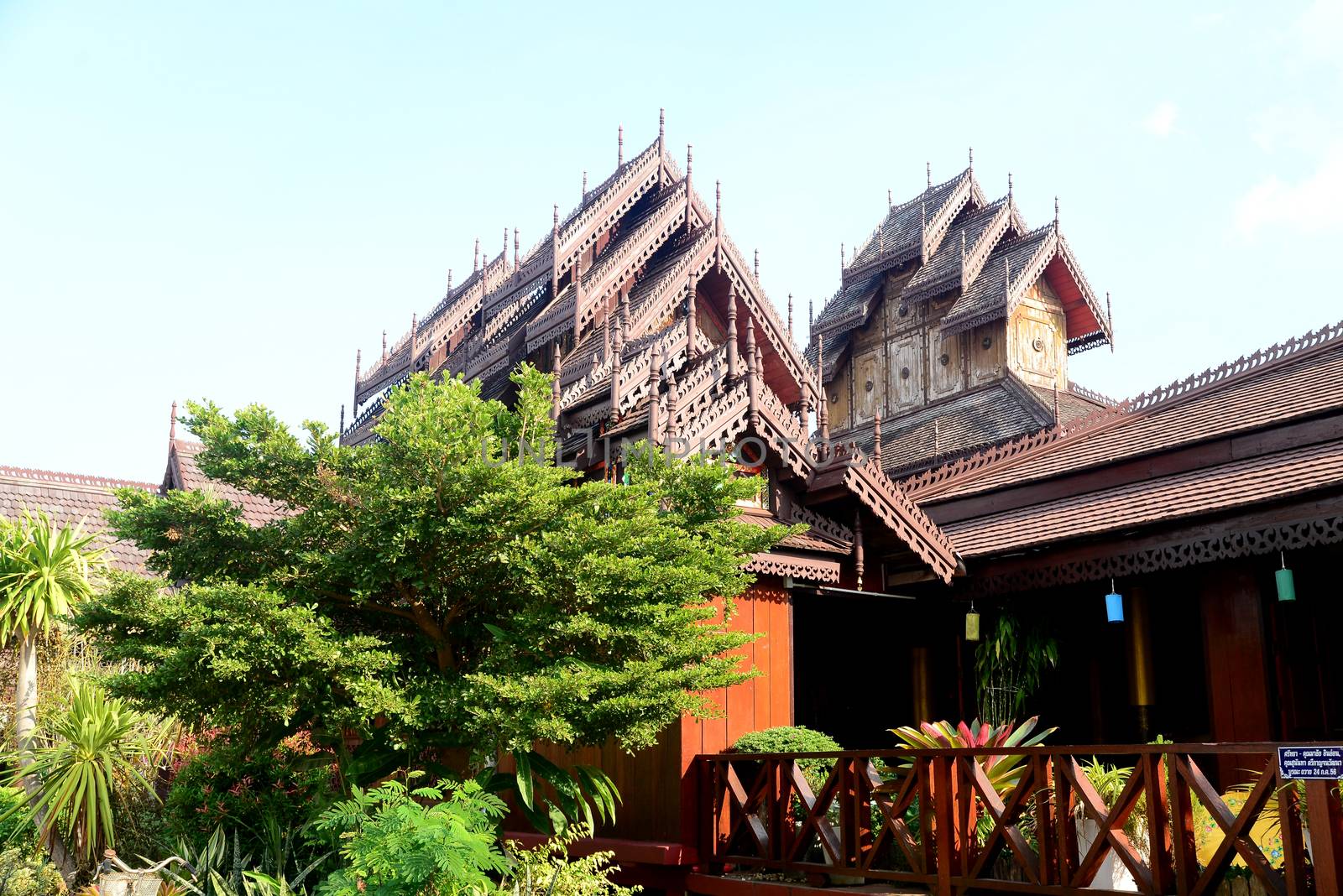 Phayao, Thailand  – 21 December, 2019 : Wat Nantaram is a Tai Yai (Shan-style) community temple in central Chiang Kham and exhibits the classic Tai Yai roof architecture, somewhat extraordinary