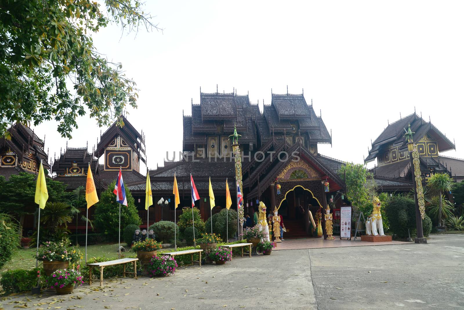 Phayao, Thailand  – 21 December, 2019 : Wat Nantaram is a Tai Yai (Shan-style) community temple in central Chiang Kham and exhibits the classic Tai Yai roof architecture, somewhat extraordinary