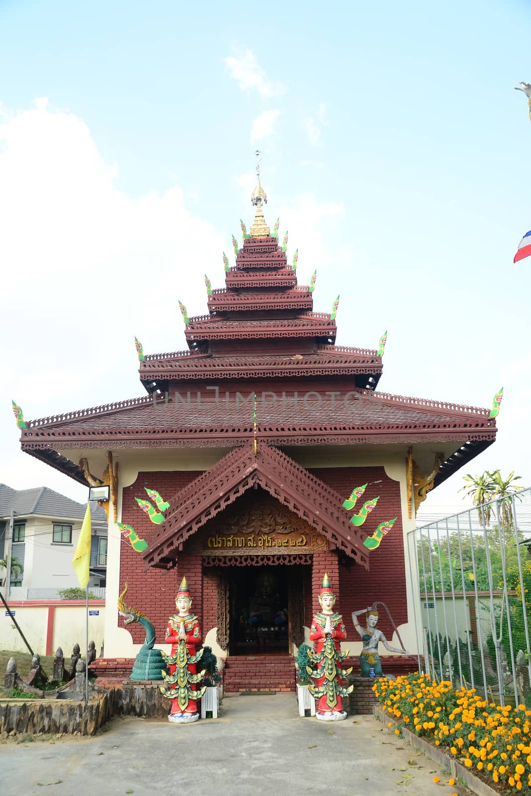 Phayao, Thailand  – 21 December, 2019 : Wat Nantaram is a Tai Yai (Shan-style) community temple in central Chiang Kham and exhibits the classic Tai Yai  architecture, somewhat extraordinary