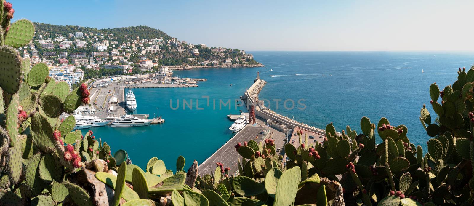 Panoramic view of the Nice city port. Sunny day, blue sea and sky. Cote d'Azur, Nice, France, Europe.