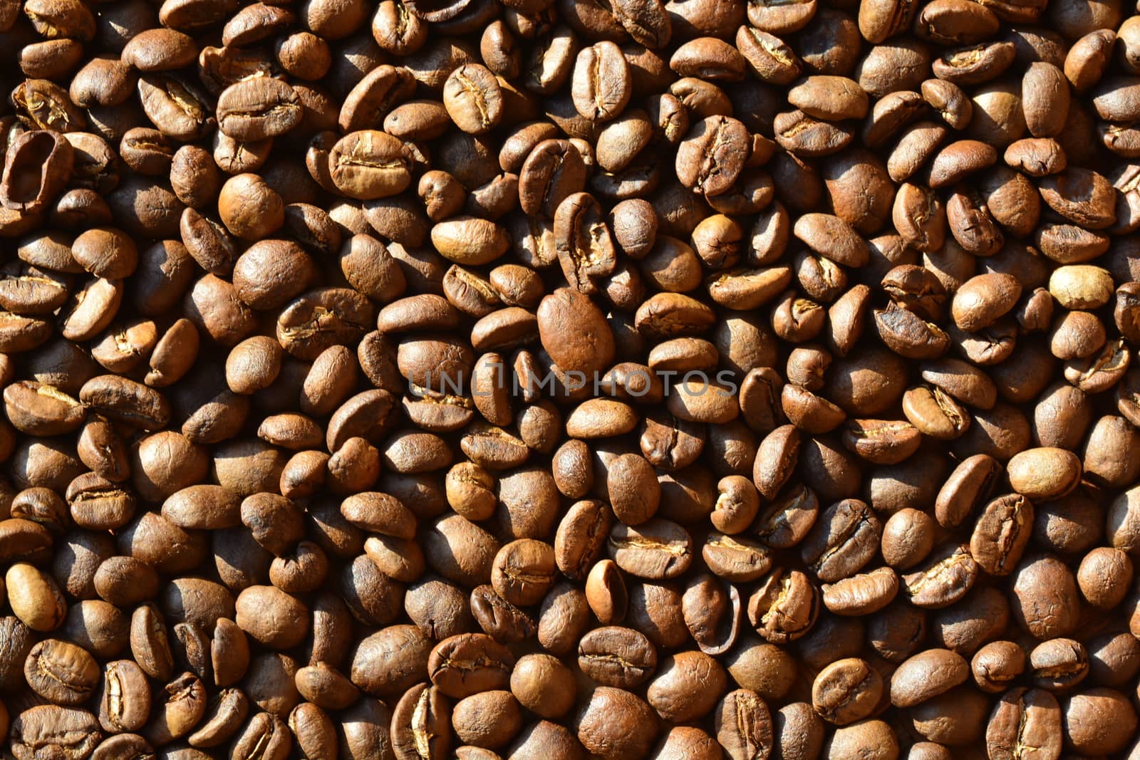 roasted arabica coffee beans, can be used as a background