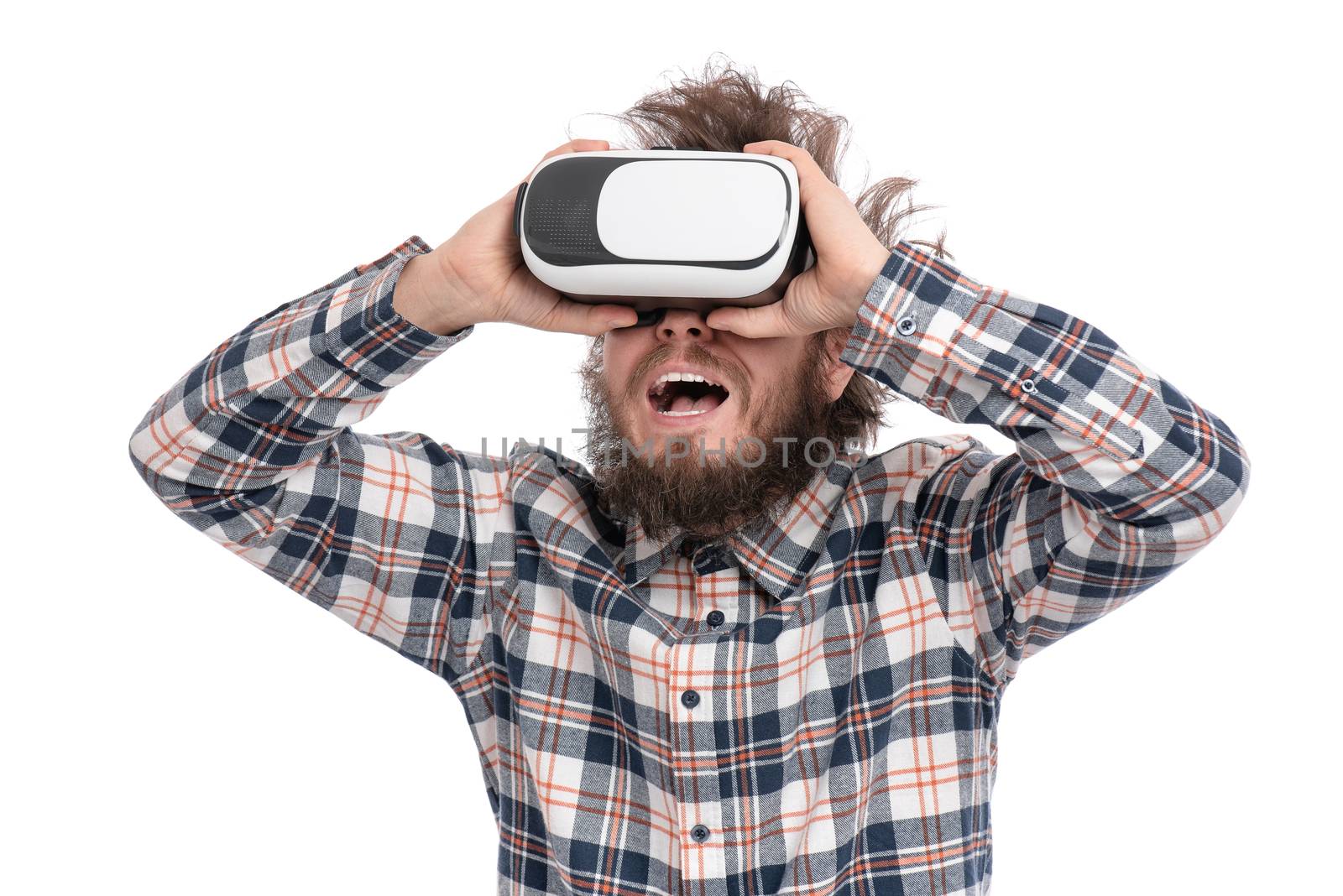 Crazy bearded man with VR goggles by fotostok_pdv