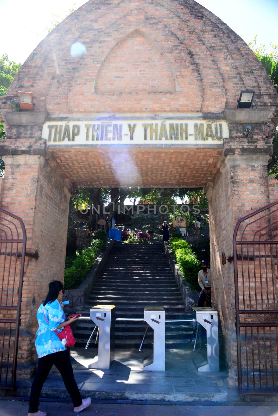 NHA TRANG, VIETNAM – 28 FEBRUARY 2020 : Tourists are entering the passageway door at Ponagar temple relics in nha trang