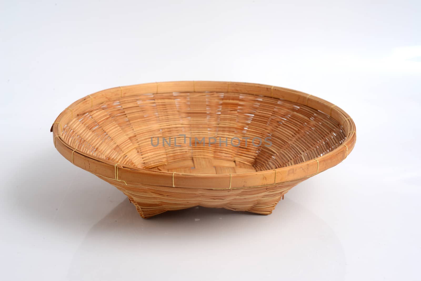 Bamboo wicker basket  on white background. by ideation90