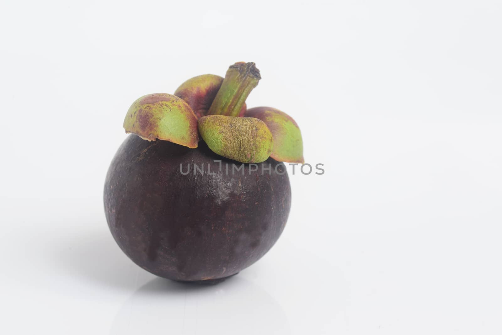 ripe mangosteen  fruit  on white background, famous fruit of Thailand