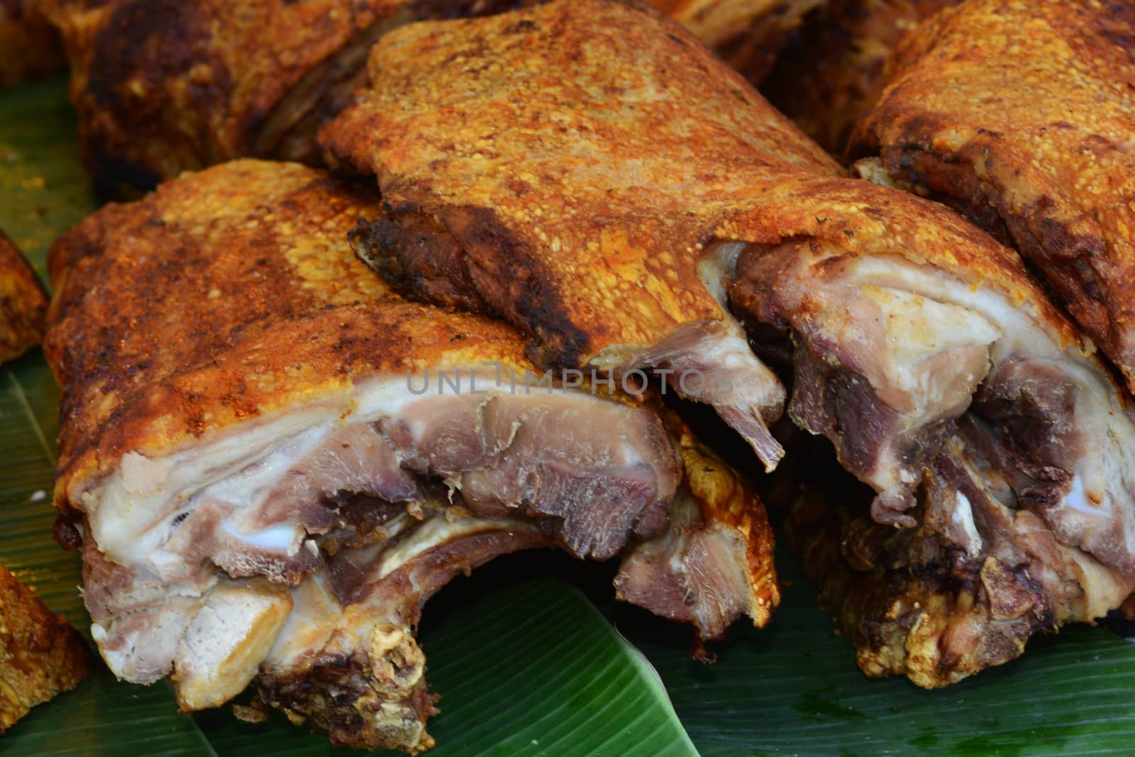 Soft focus of Trang Moo Yang, Roast Pork in Trang, Thailand, The Roasted Pork is rich in its flavor with a thin and crispy pork skin.