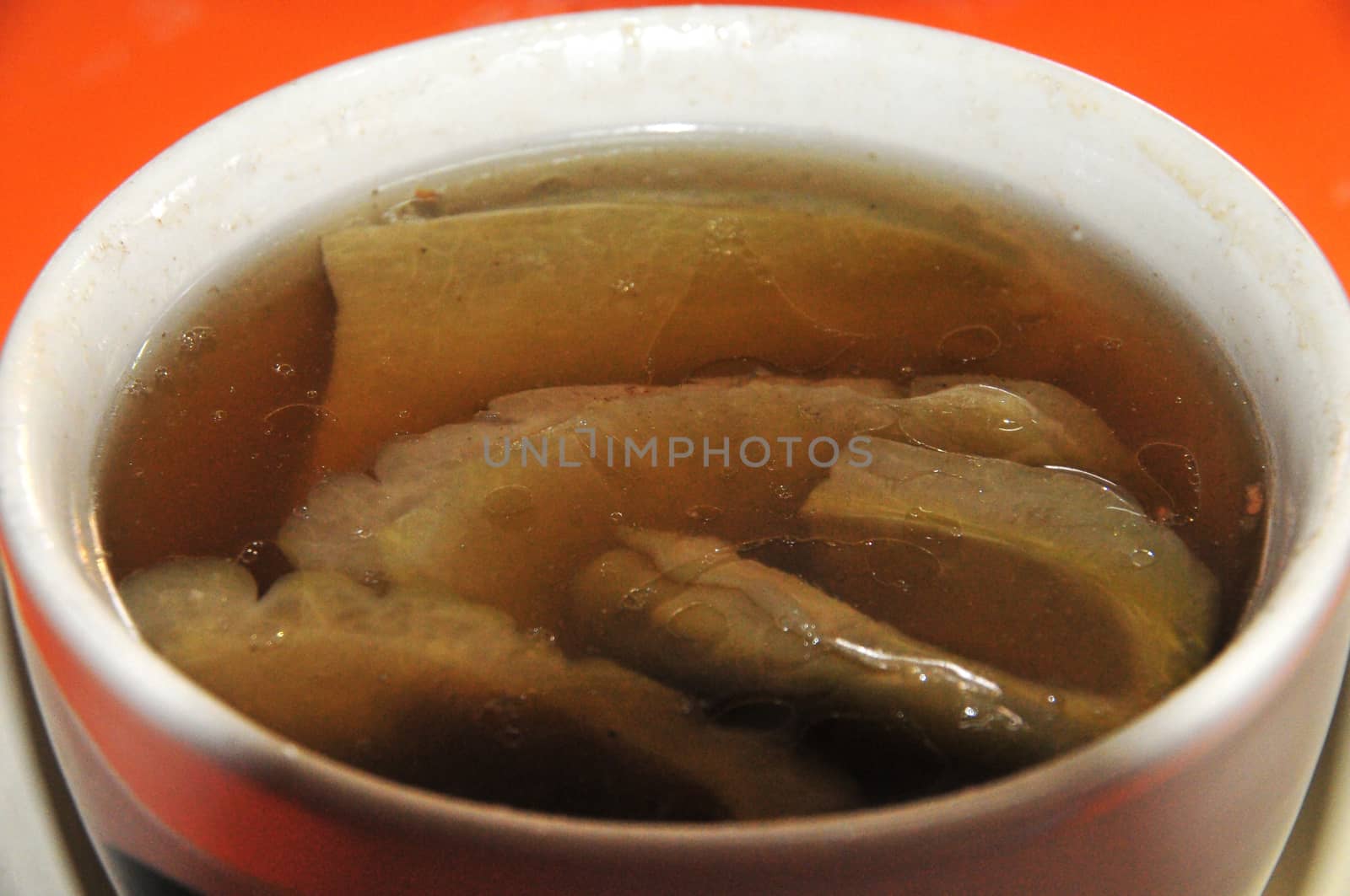 Bitter gourd with pork spare rib soup in steamed bowl