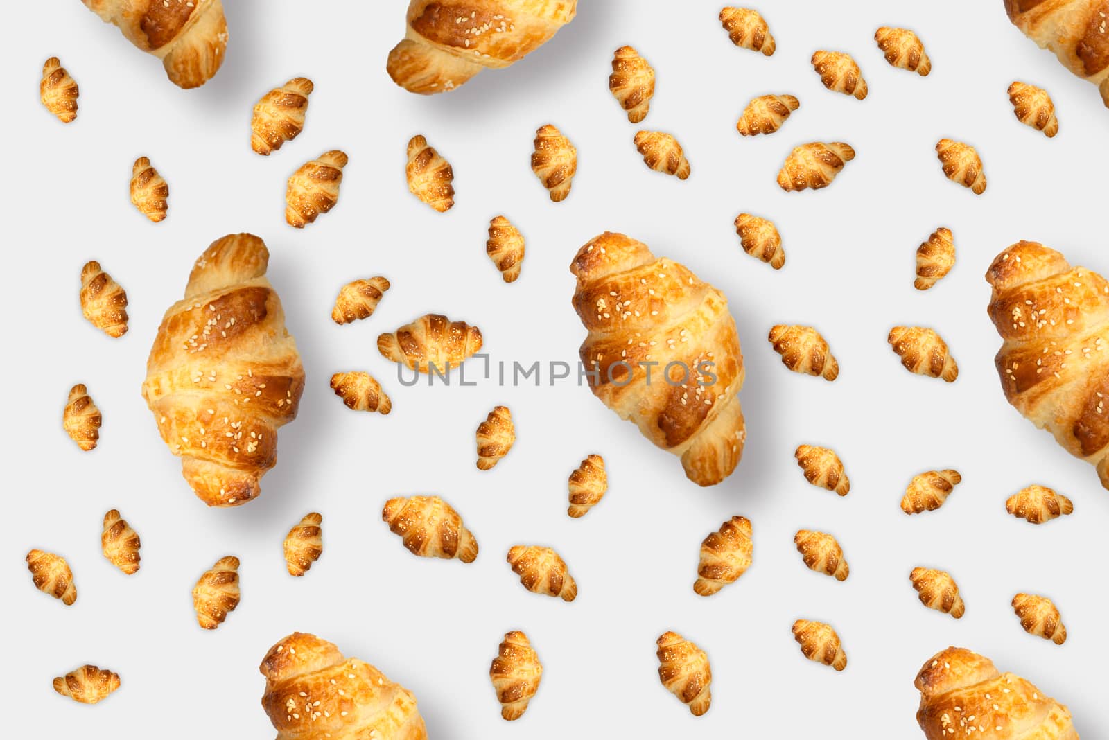 Pattern French croissant on a light background by marynkin