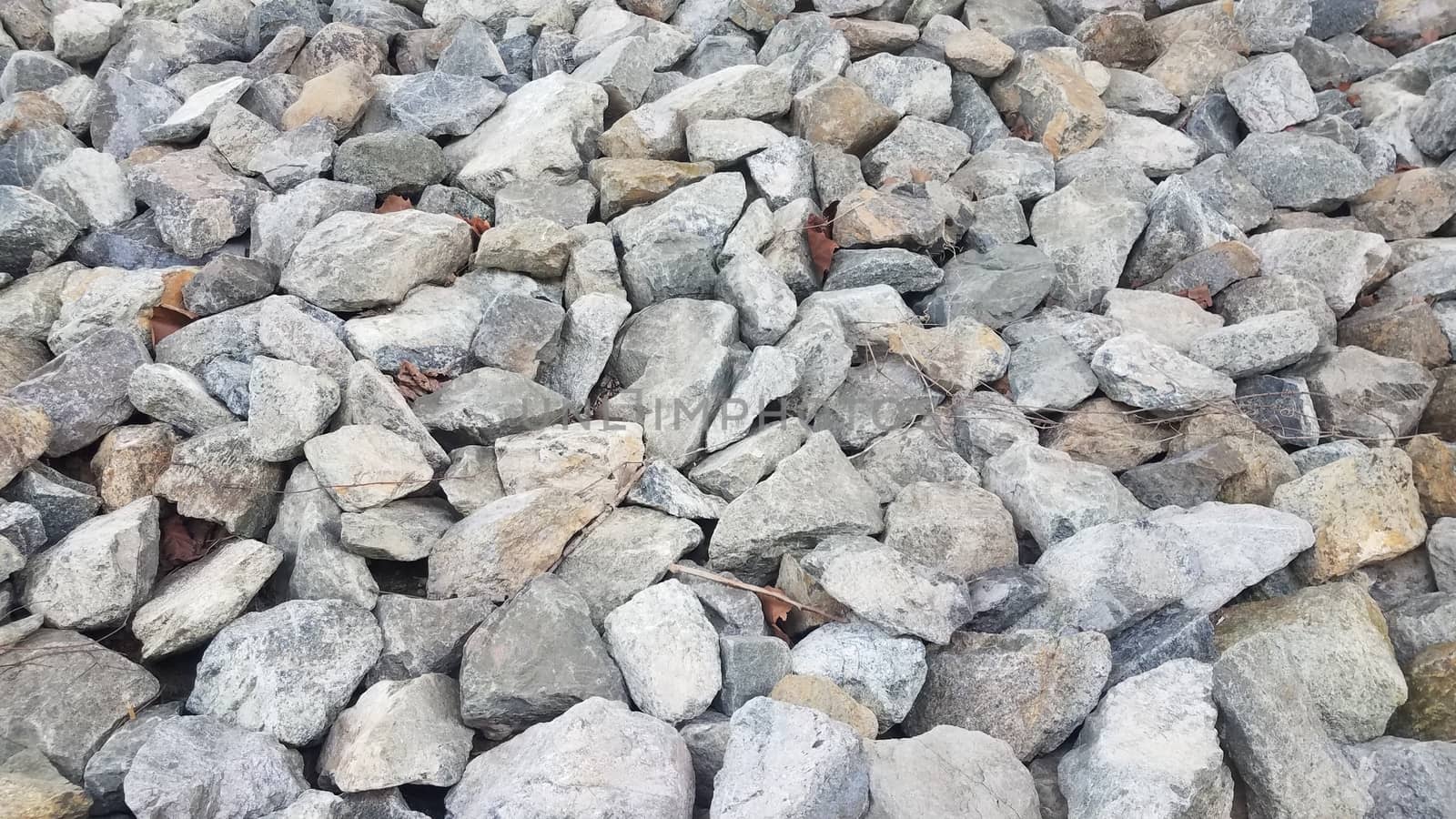 grey rocks or stones or boulders or background by stockphotofan1
