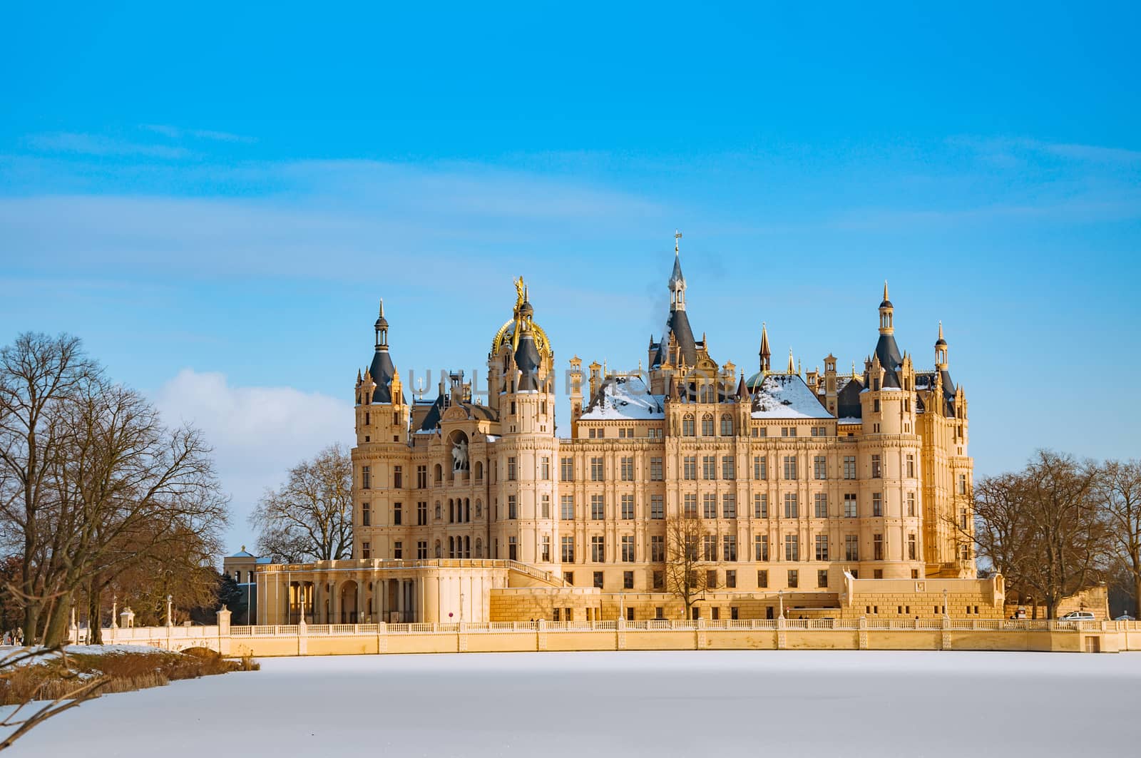 The beautiful, fairy-tale Castle of Schwerin in winter times by Fischeron