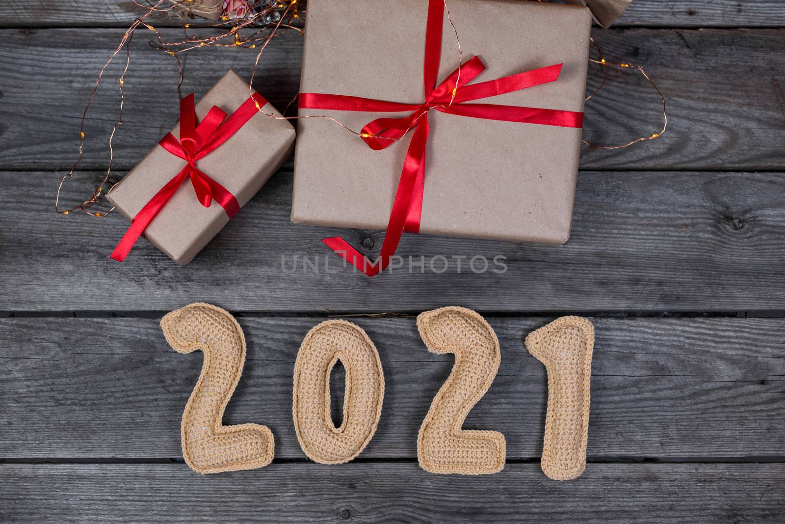 Christmas background with crocheted numbers 2021
