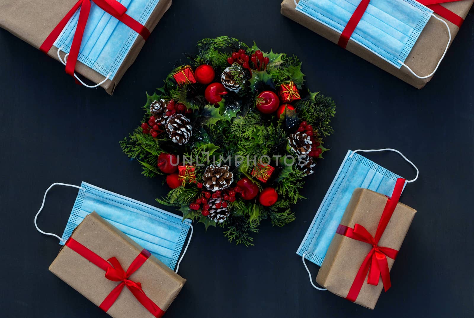 .New year in the context of coronavirus presents with medical masks on a chalk board