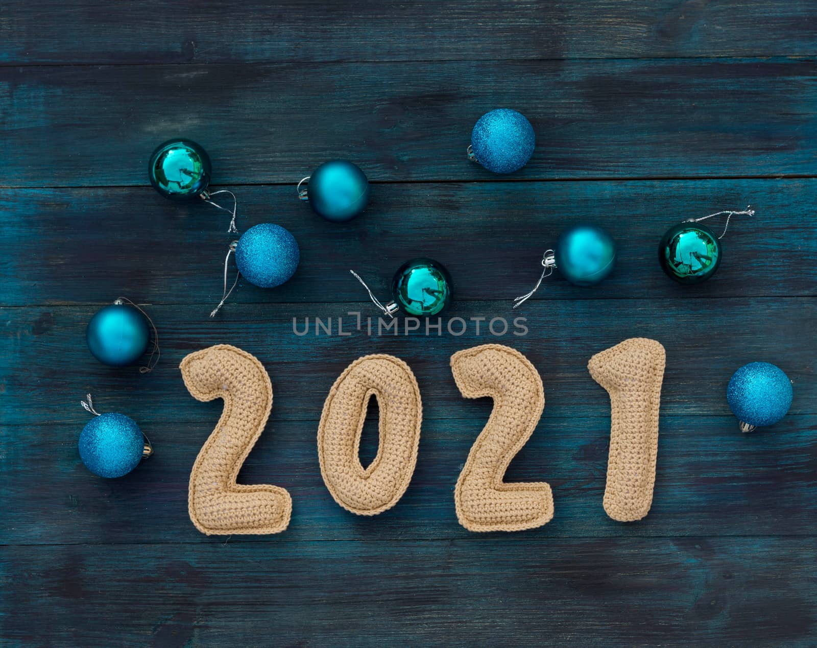 Christmas background with chroched 2021 number with copy space top view by galinasharapova