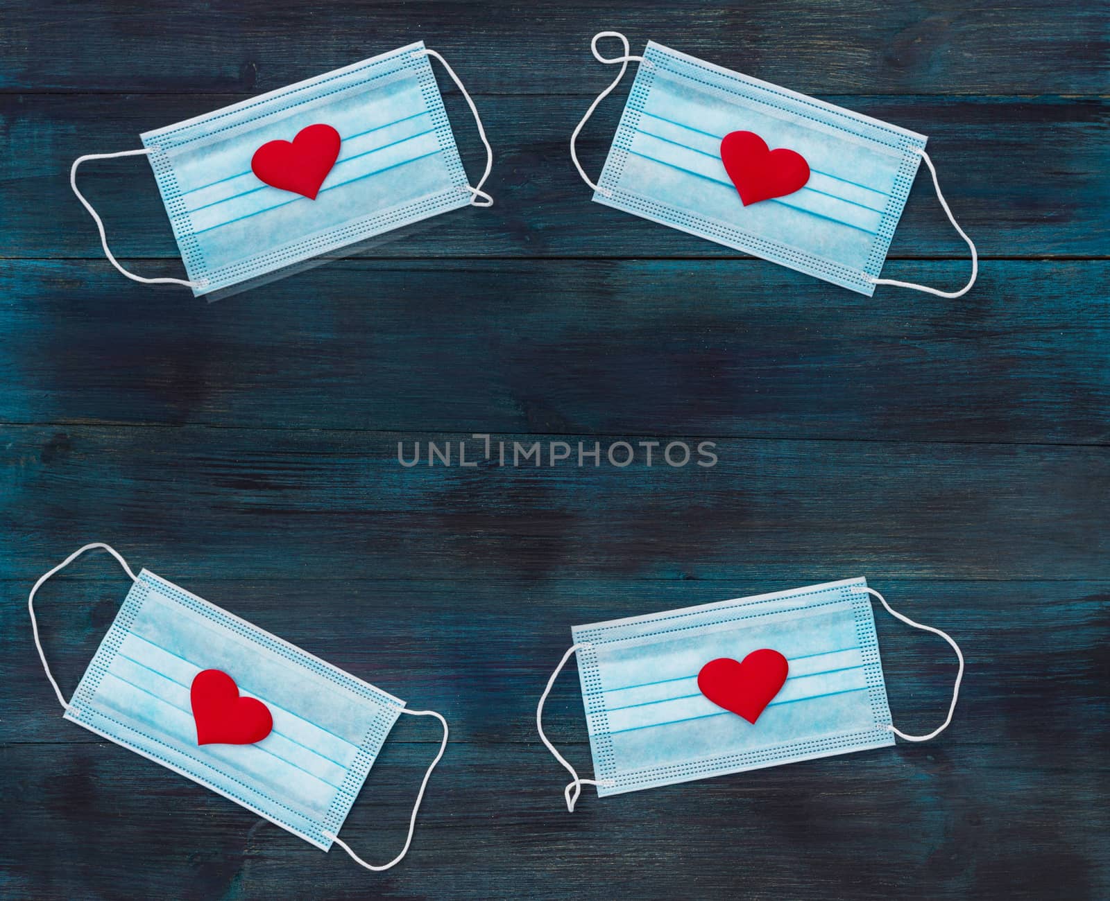 Valentine's day romantic background with medical masks symbolizing coronavirus pandemic and social distancing