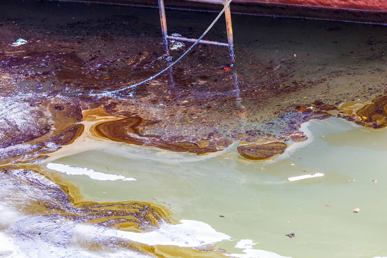 Ecological catastrophy. Spill of oil products into the sea.