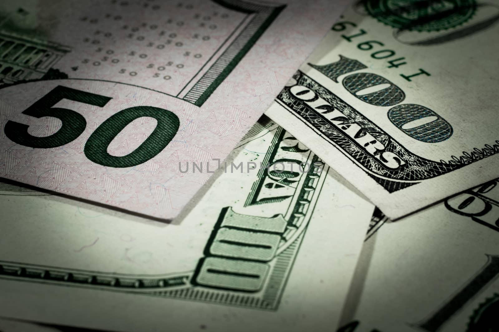 Close-up photo of money. A bunch of dollar bills. U.S. dollars.