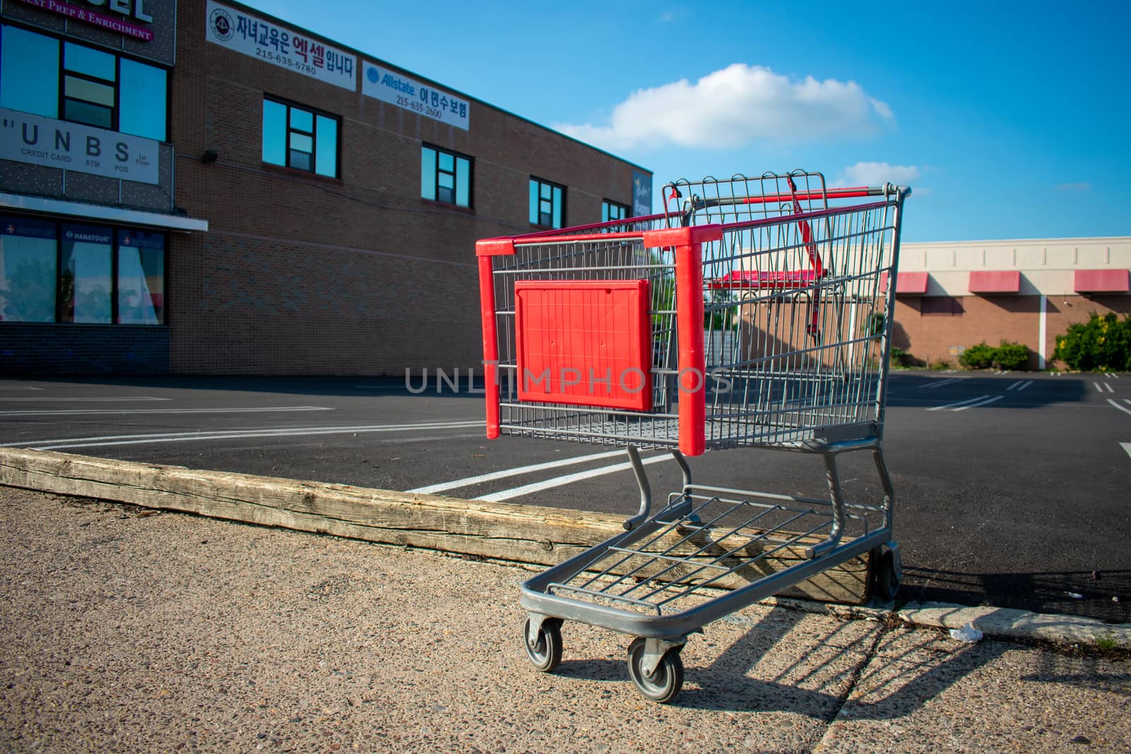 ELKINS PARK, PENNSYLVANIA-MAY 25,2020: A Lone Shopping Cart Rest by bju12290