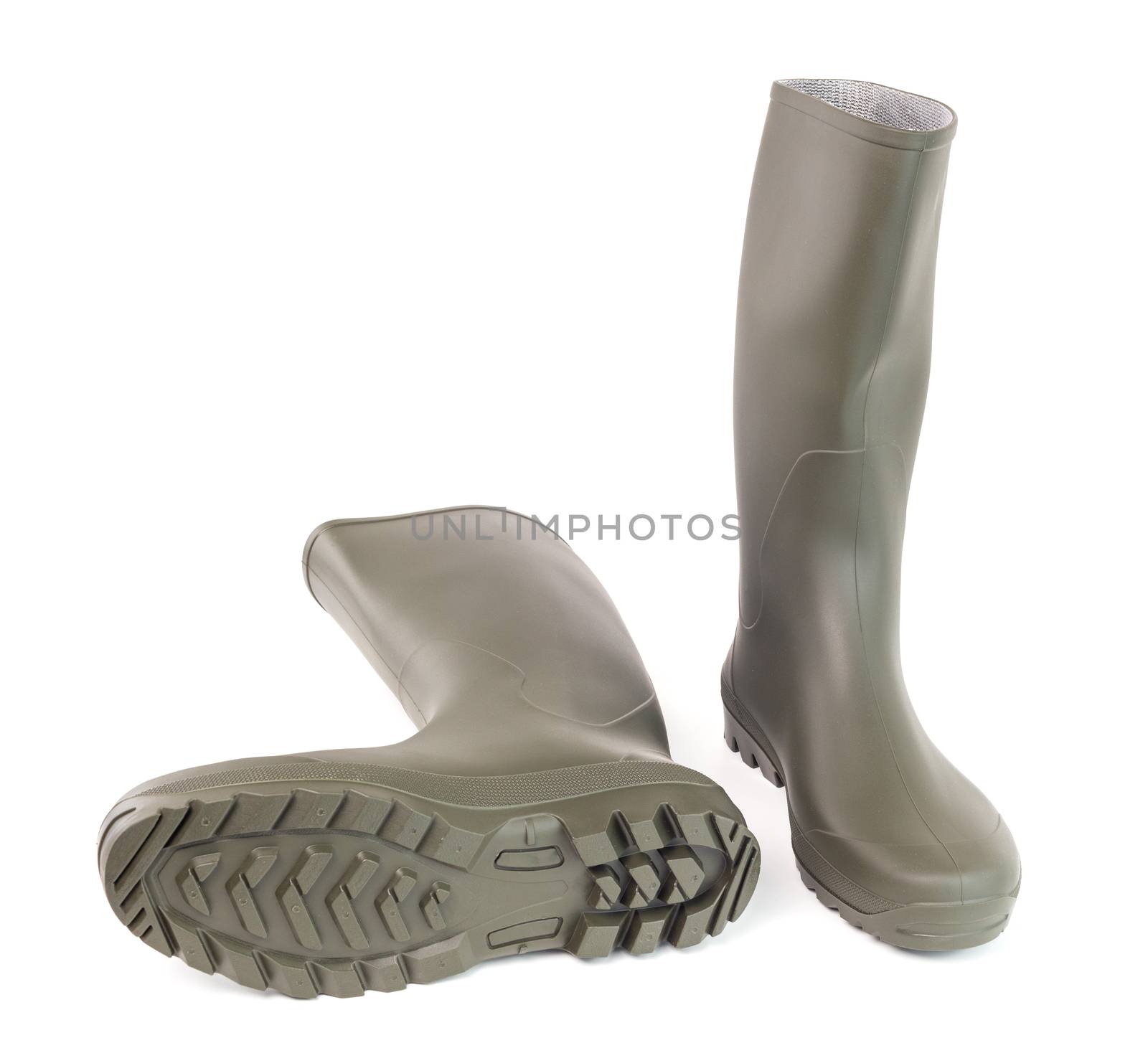 Pair of green clean rubber boots isolated on white background. Front view.
