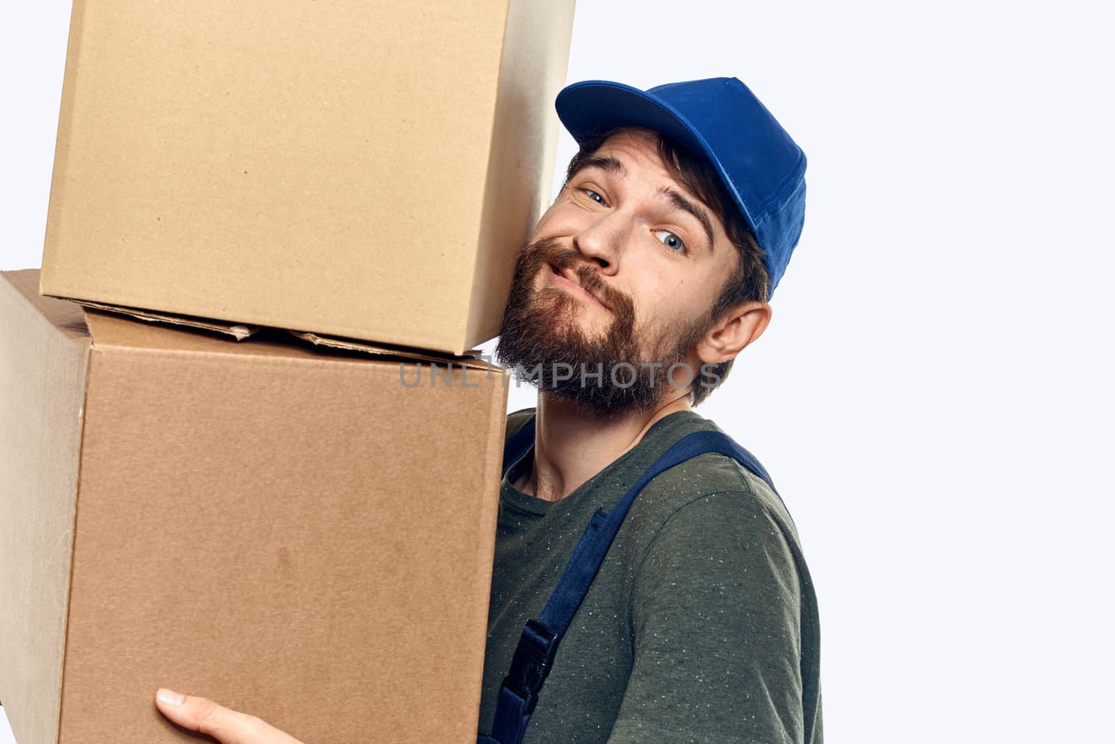 Working man with boxes in hands delivery service work lifestyle by SHOTPRIME