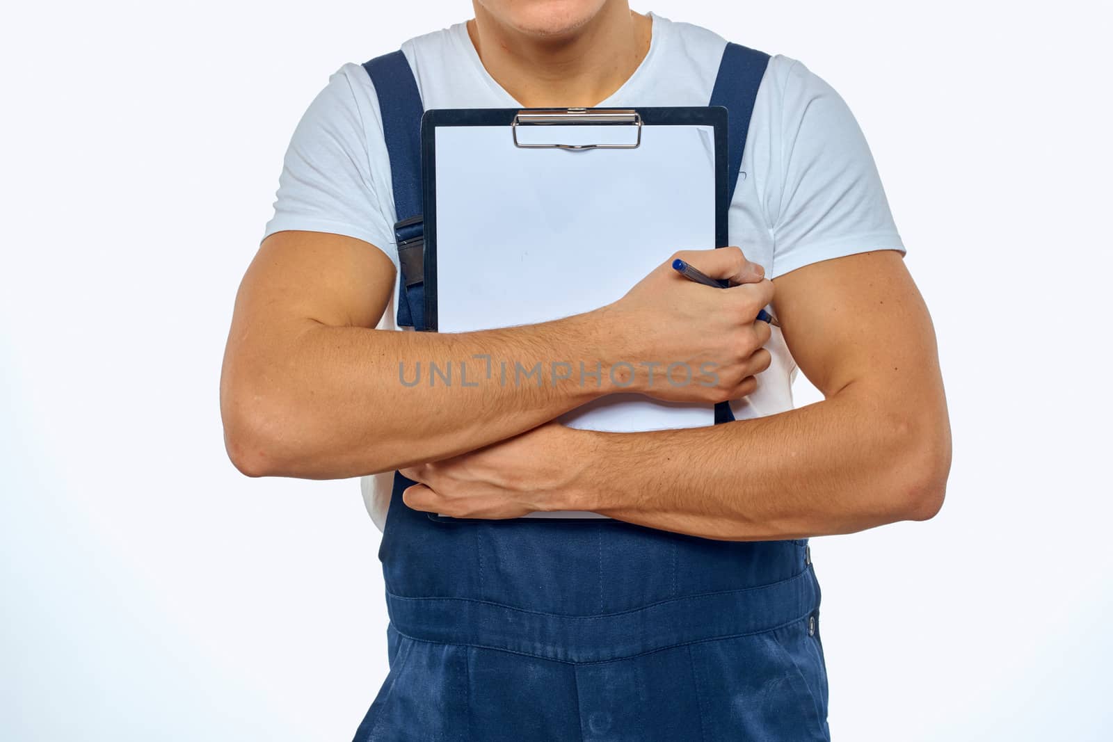 Working man in uniform documents delivery service courier by SHOTPRIME