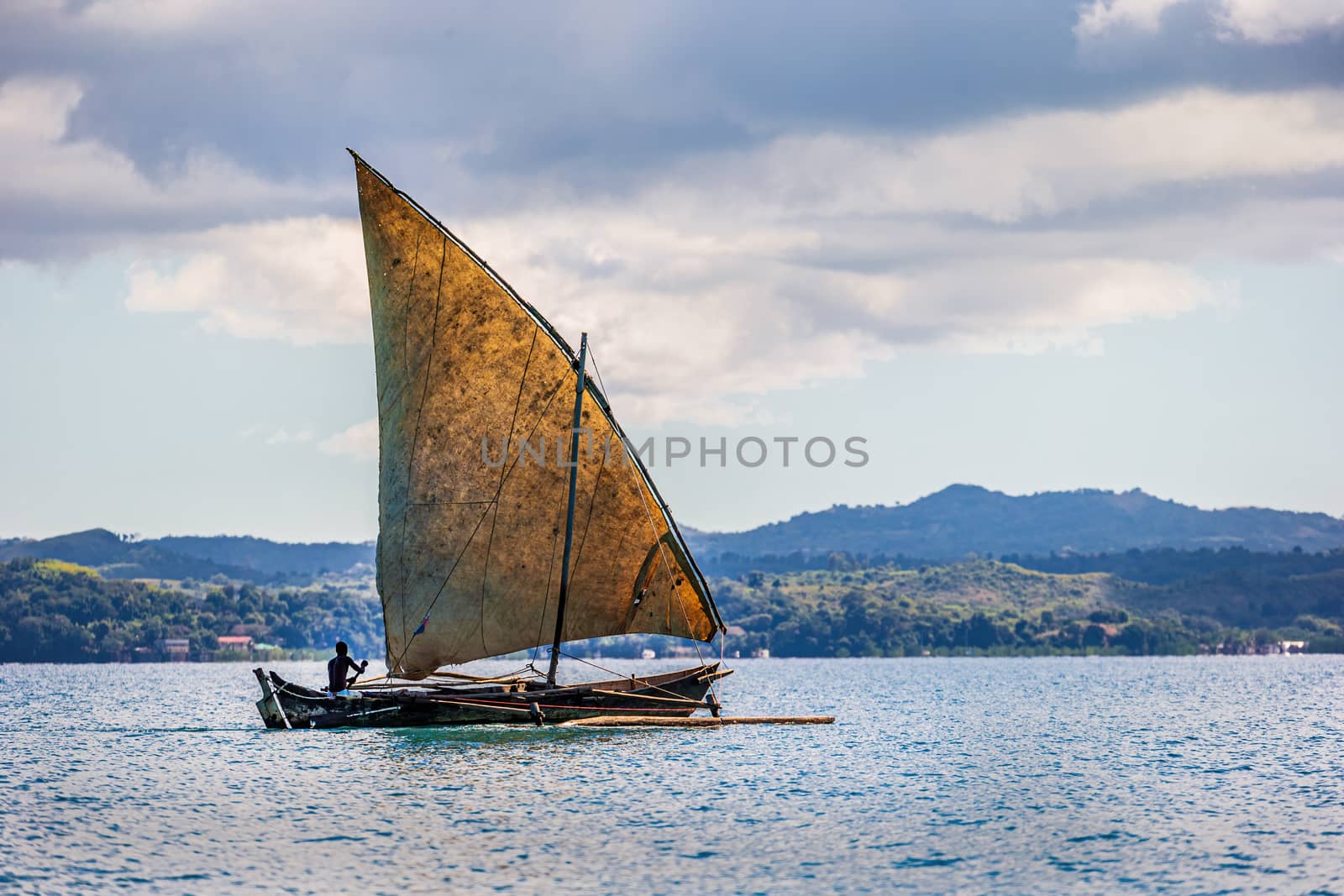 Fisherman sailing near Nosy Be, Madagascar by COffe