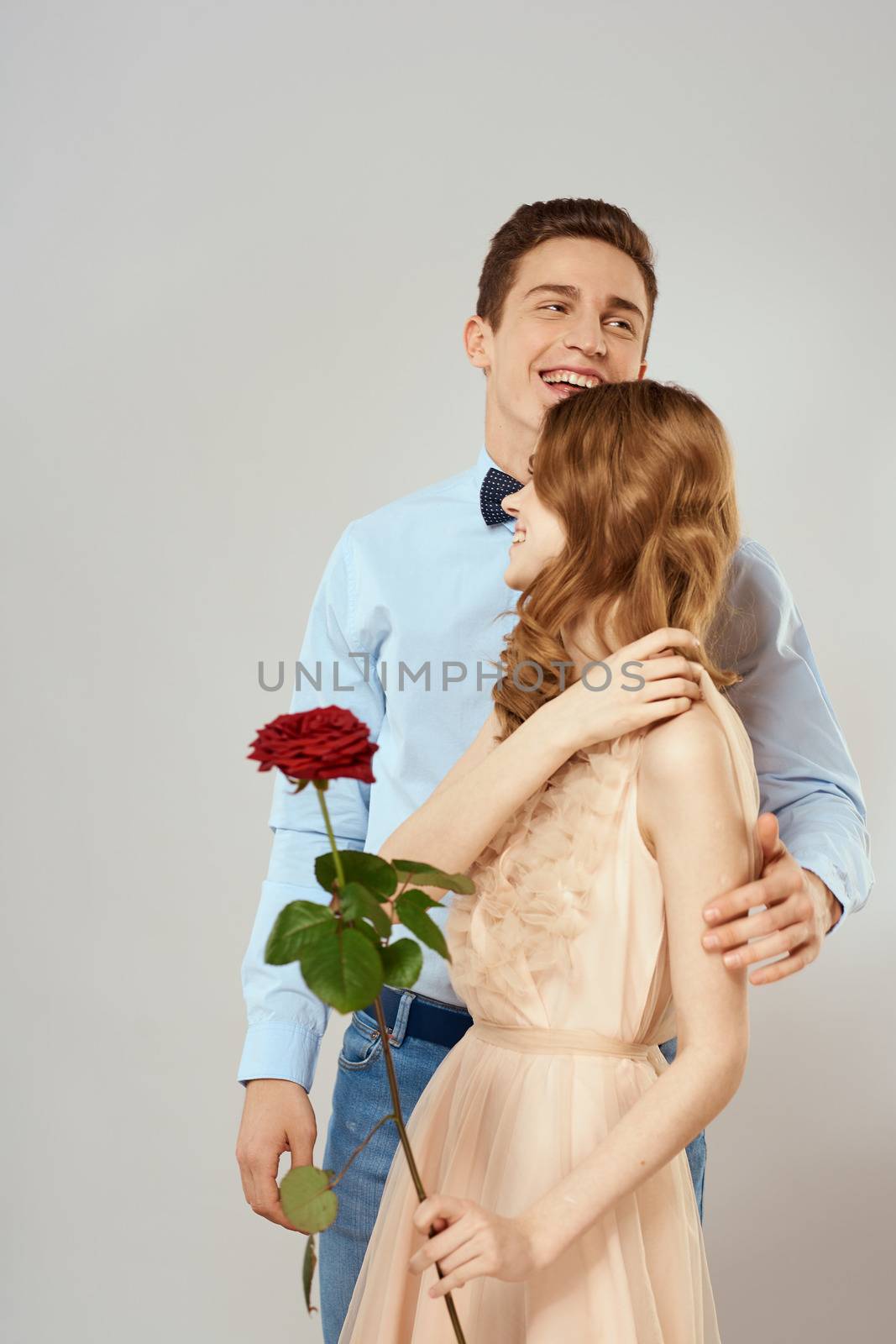 man giving woman roses relationship charm lifestyle embrace lifestyle. High quality photo