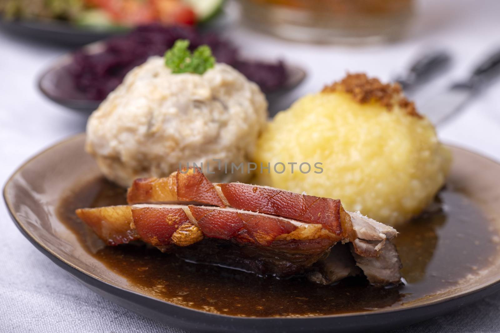 bavarian roasted pork with different dumplings