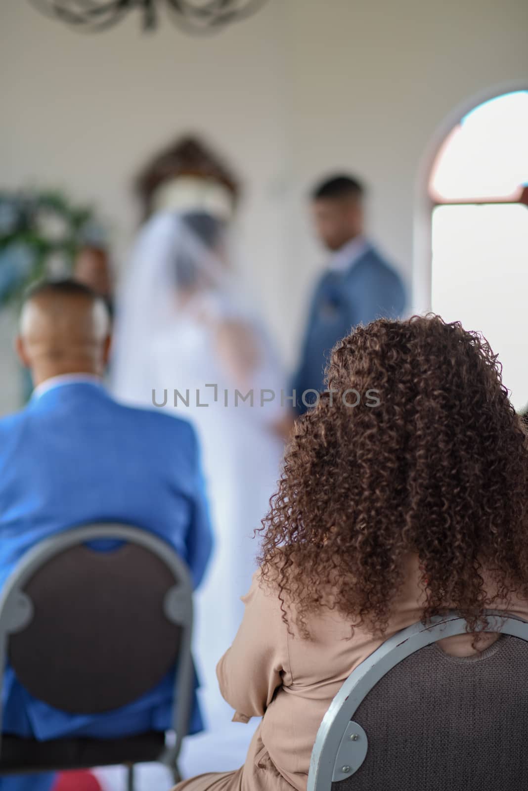Blurred background of couple getting married