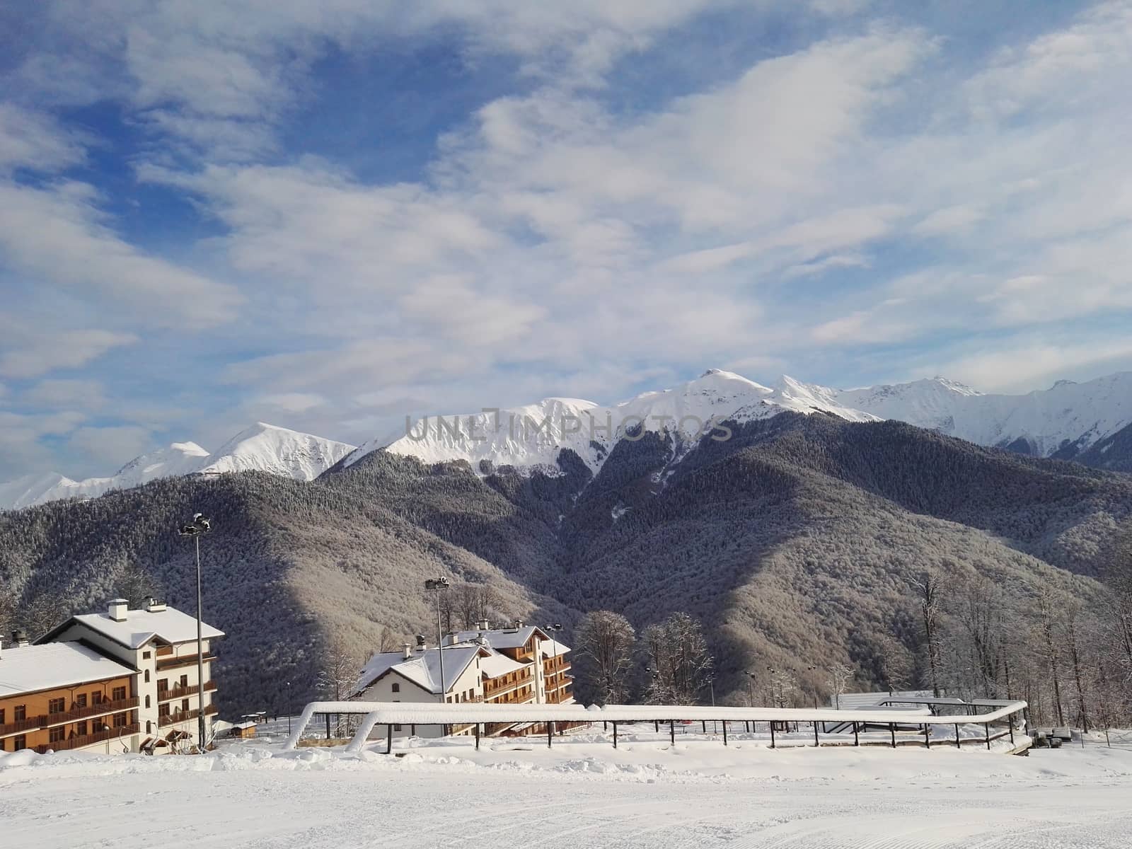 Winter ski resort mountain view hotels and slope. by galinasharapova