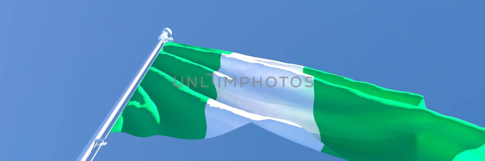 3D rendering of the national flag of Nigeria waving in the wind against a blue sky