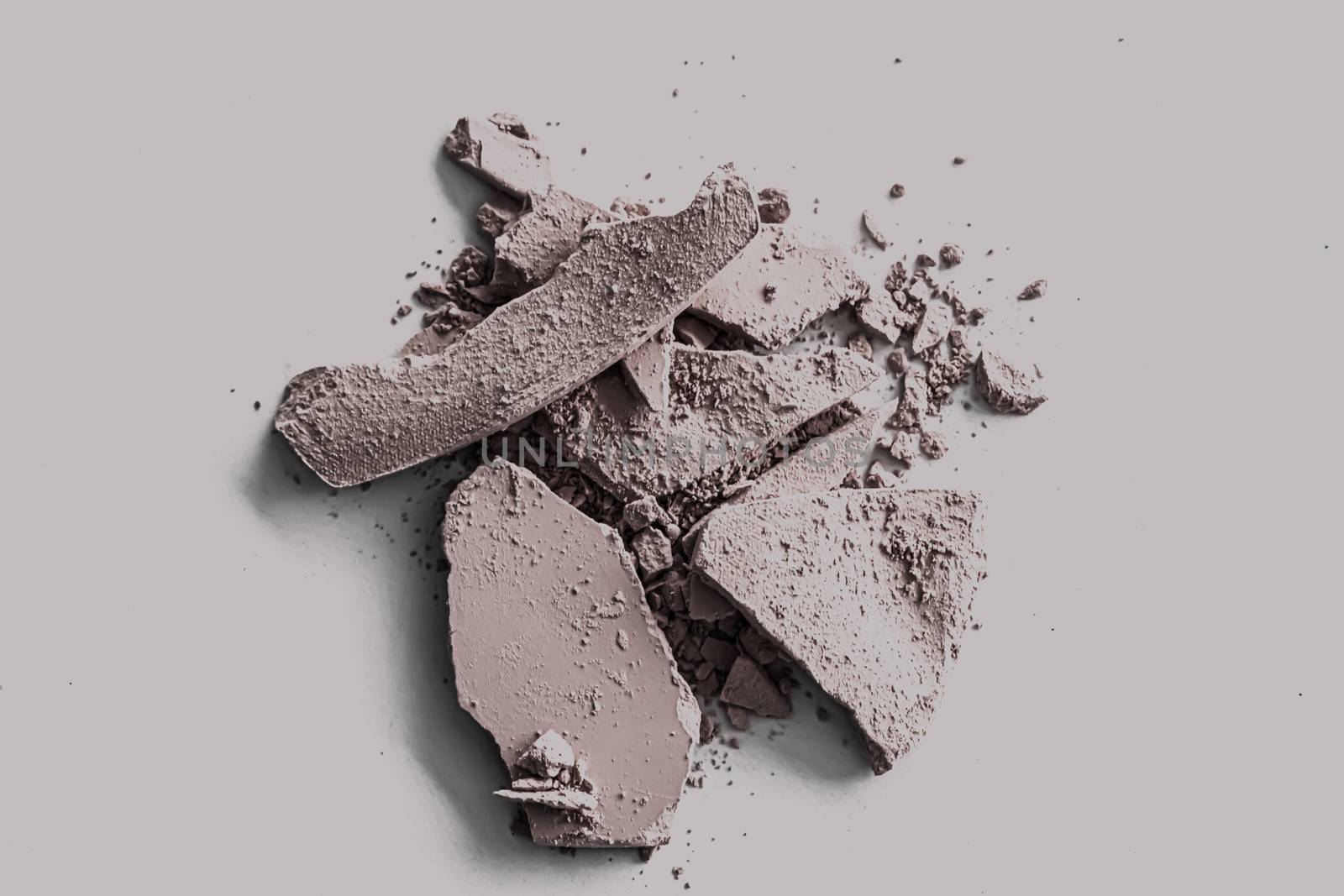 Pale eye shadow powder as makeup palette closeup, crushed cosmetics and beauty textures