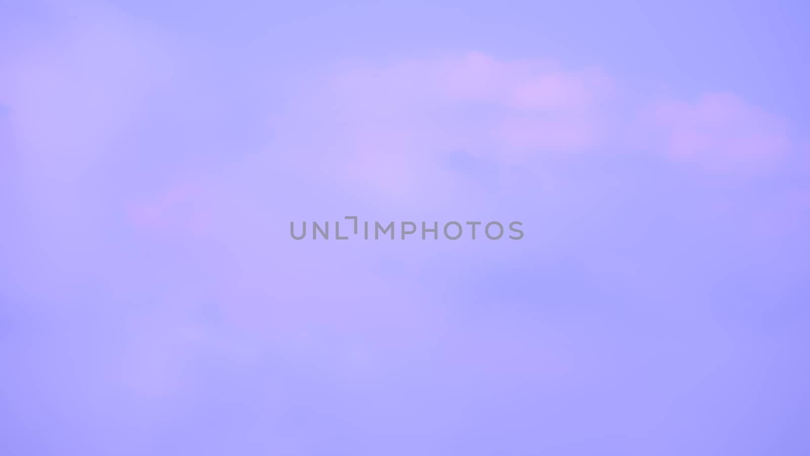 Abstract cloud on the sky with purple blurred background by Nikkikii