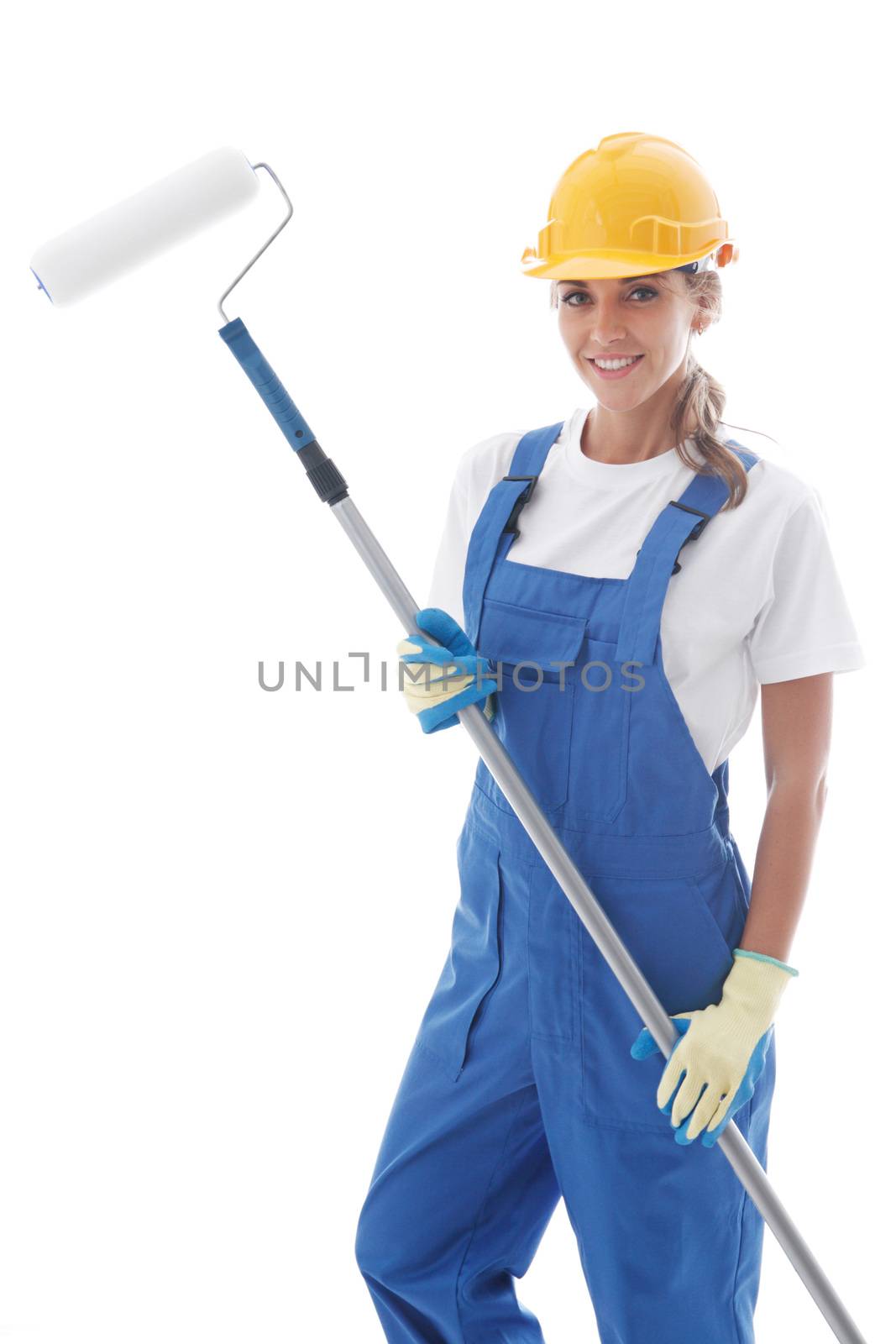 Female house painter in blue uniform coveralls and yellow hardhat with paint roller isolated on white background