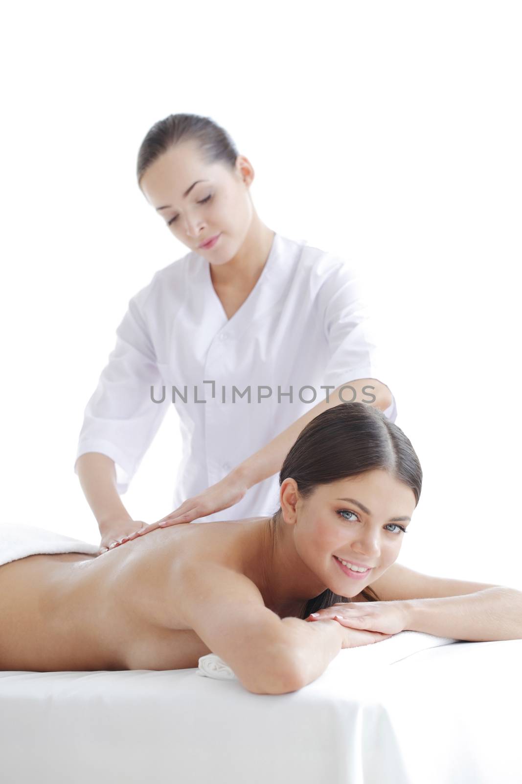 Attractive woman getting spa treatment by ALotOfPeople